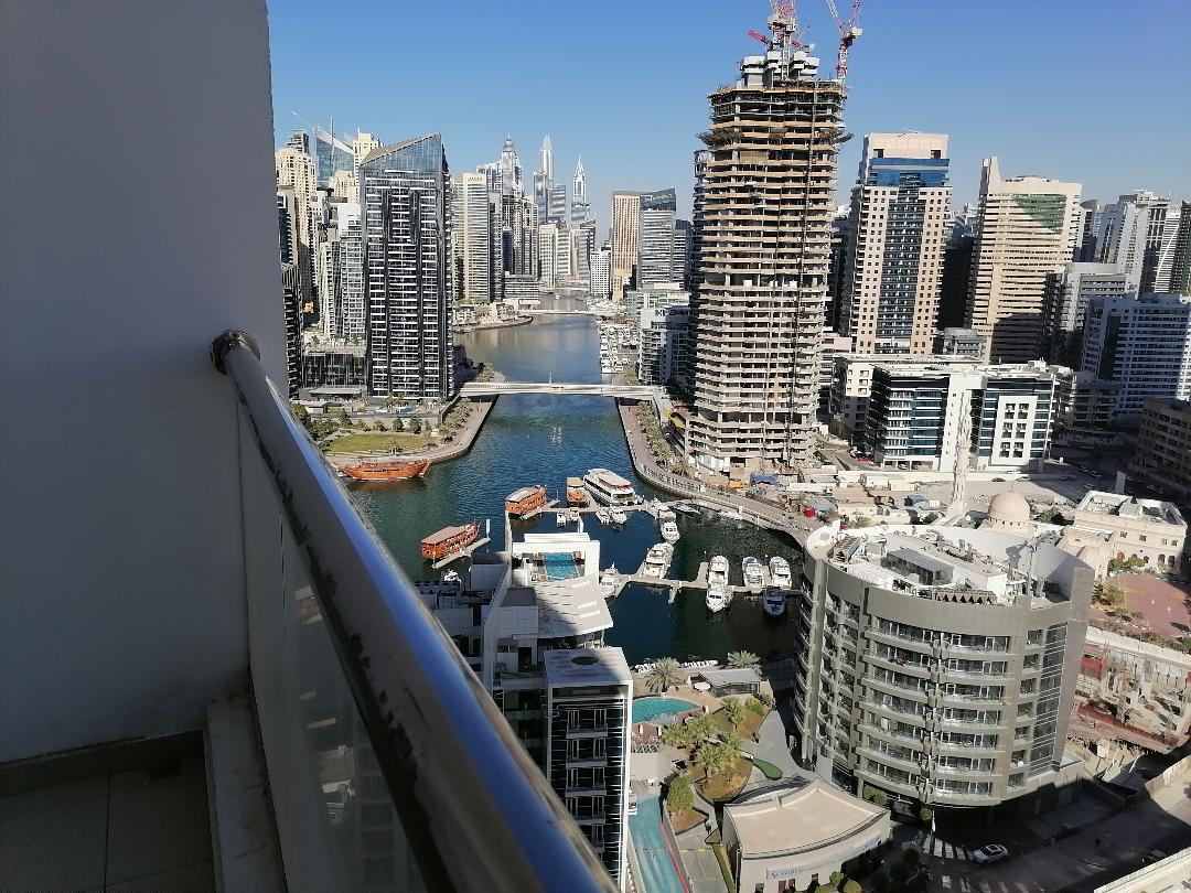 Dubai marina , 1 b/r with partial marina view , chiller free , 4 cheques , high  floor