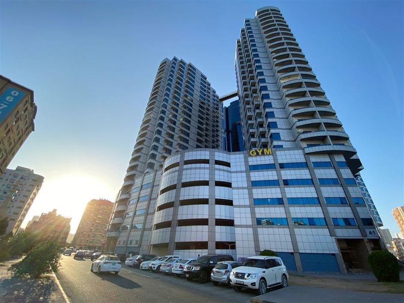 Falcon Tower: Big 2 Bed Hall with Parking in Downtown Ajman