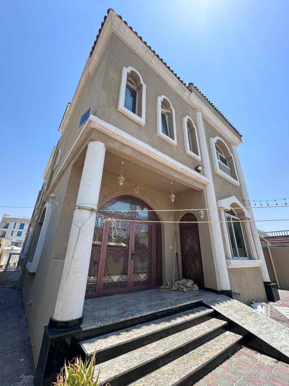 Two-storey villa for rent in Ajman, Al Rawda 1 area 5 bedrooms, a living room and a living room And a maid's room 120 thousand required