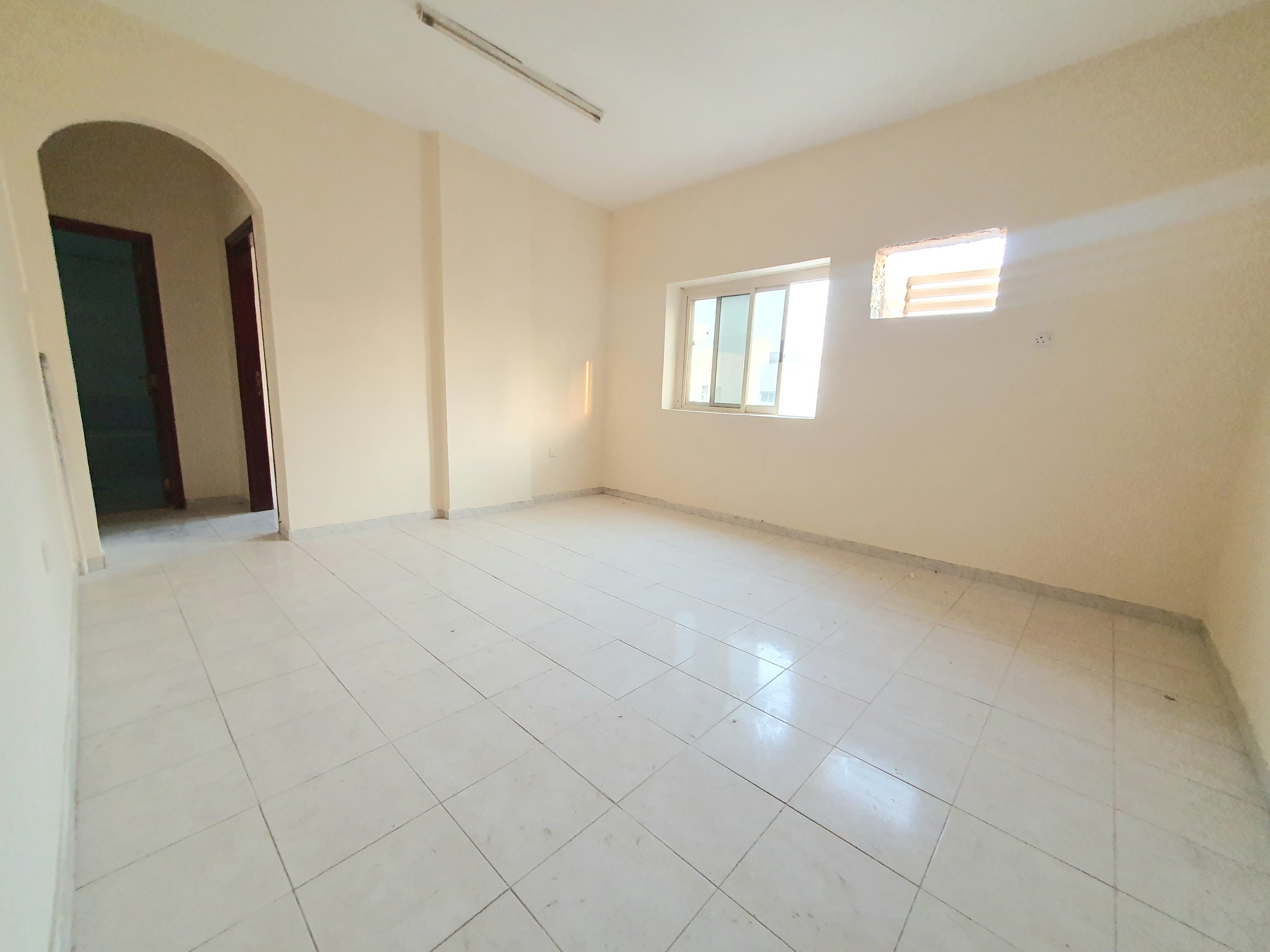 LAVISH VERY BIG 1BHK ON ROAD BUILDING IN MUWAILEH