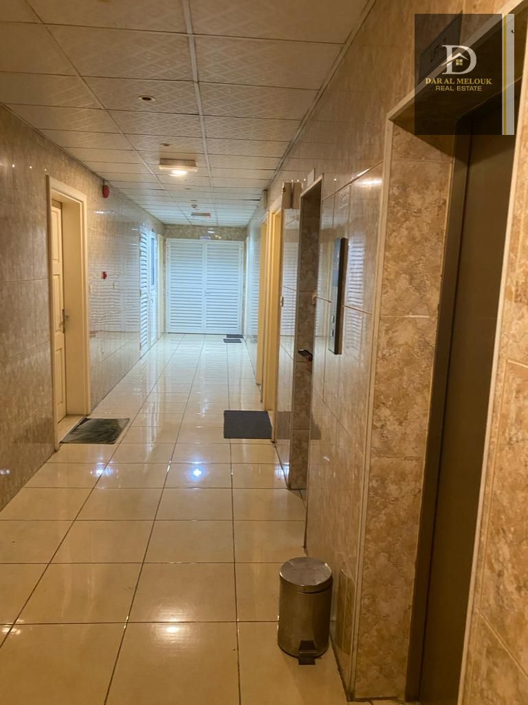 For sale in Sharjah, Al Qasimia area, a residential and commercial building Income return of up to 10%