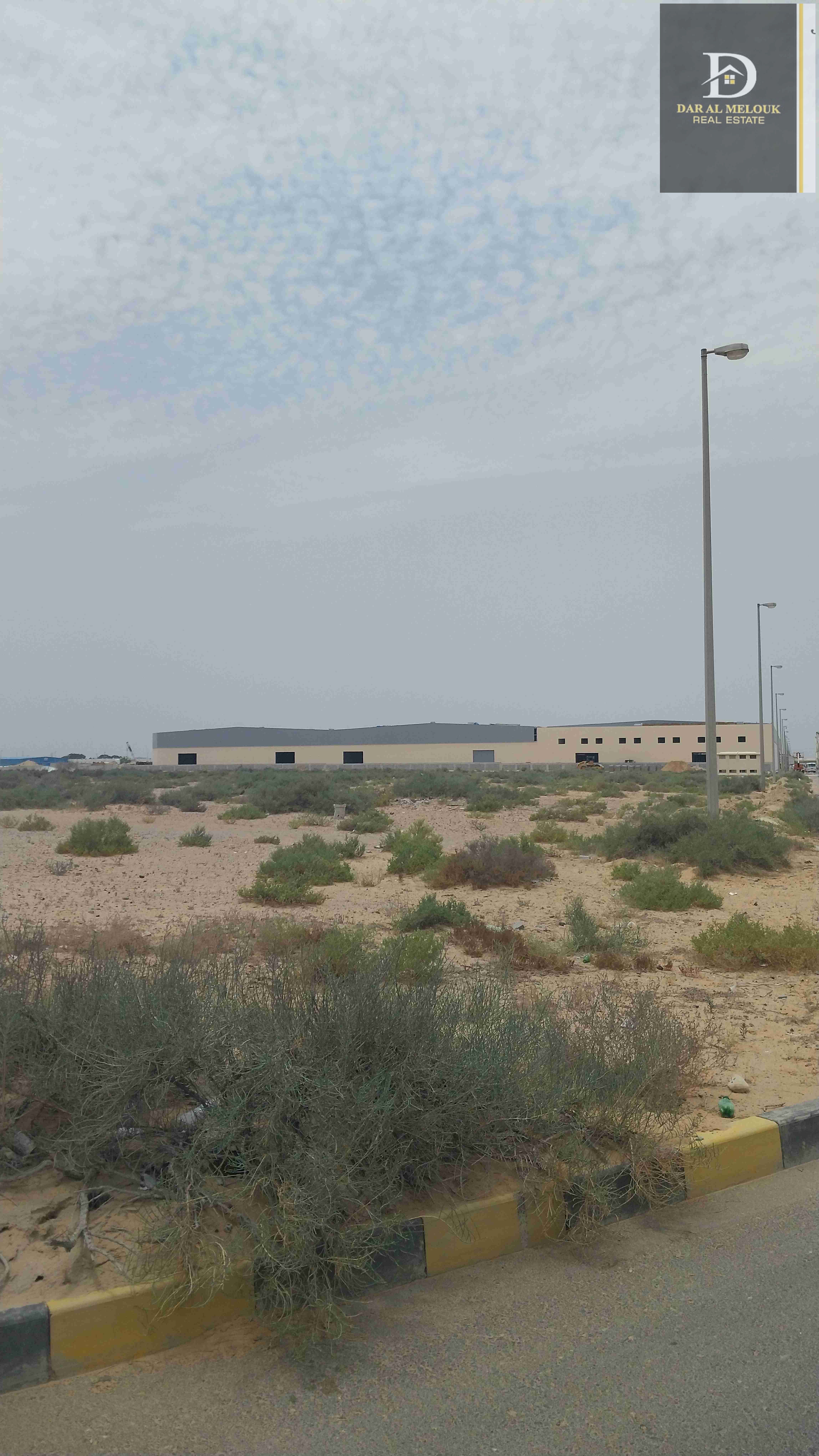 For sale in Sharjah, Al Sajaa area Emirates Transit City 34,000 sq. ft. industrial land Commercial industrial permit Excellent location