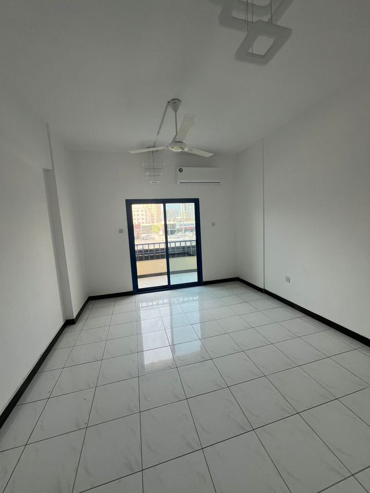 A room and a hall on Al Ittihad Street, directly next to the Emirates Markets, 1 bathroom and a balcony, 29 thousand