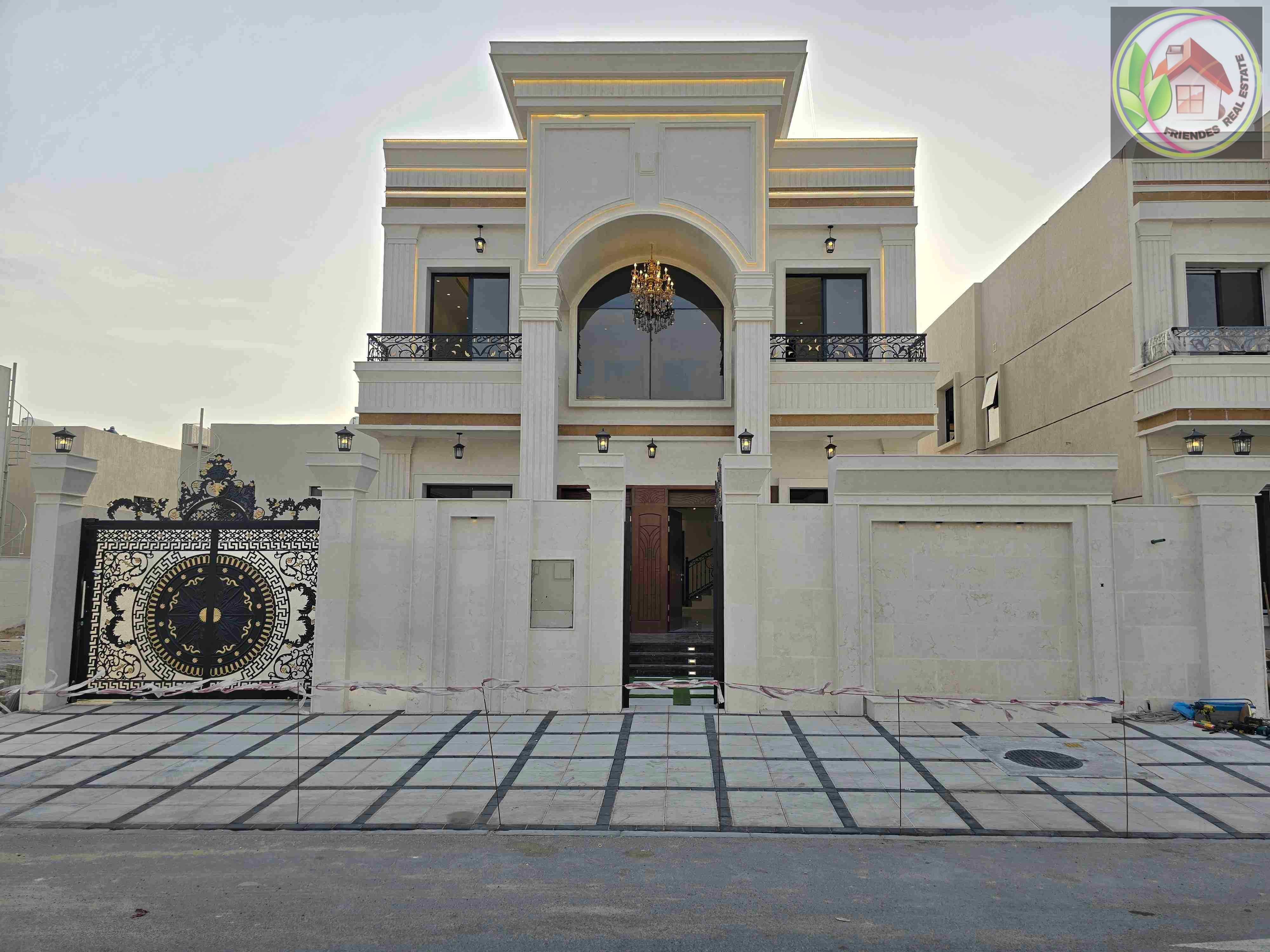 Without down payment, for sale, including registration fees, a villa directly on Sheikh Mohammed bin Zayed Road, close to all services, freehold for all nationalities.