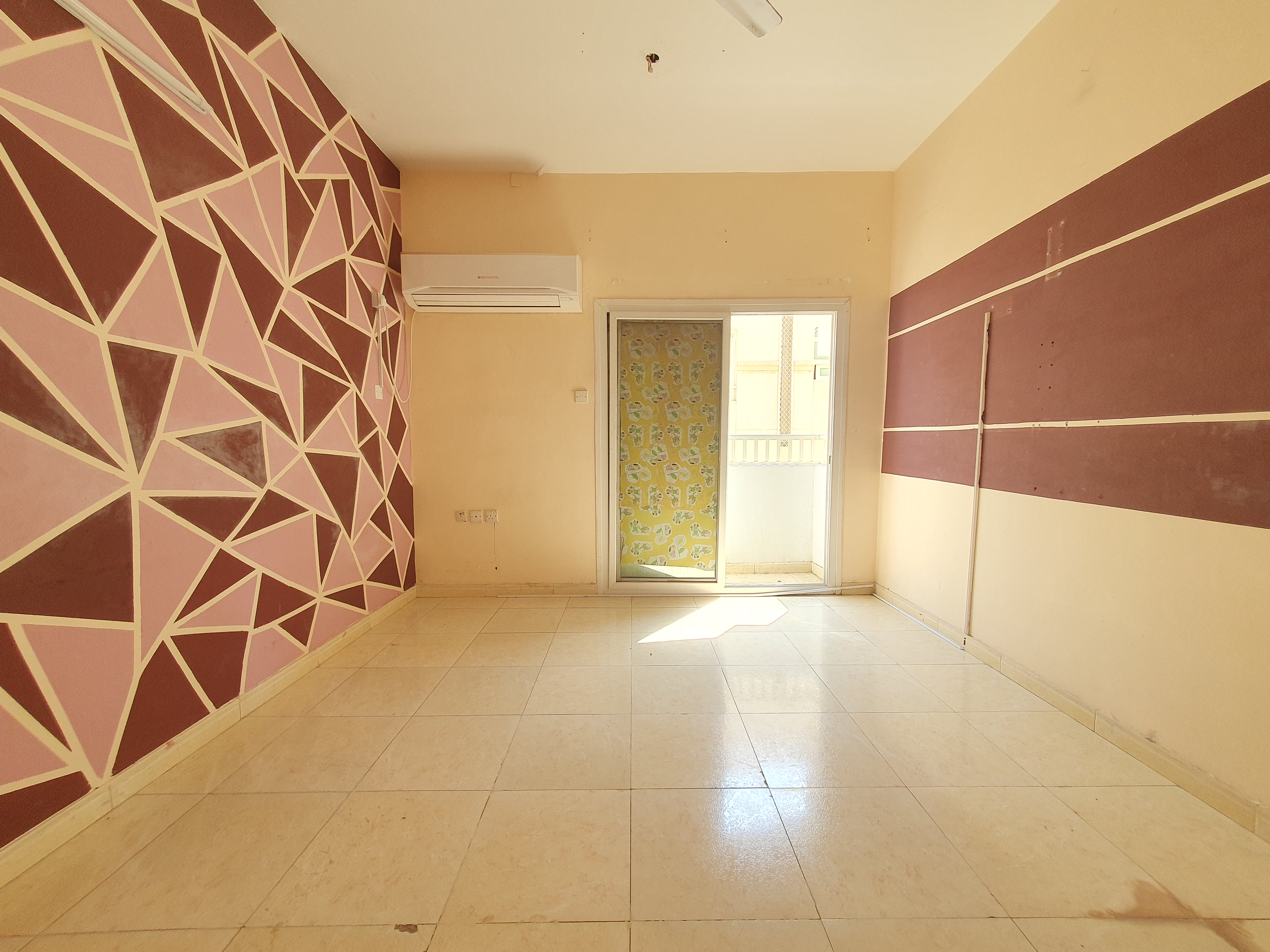 AMAZING 1BHK WITH BALCONY ON ROAD BUILDING IN MUWAILEH