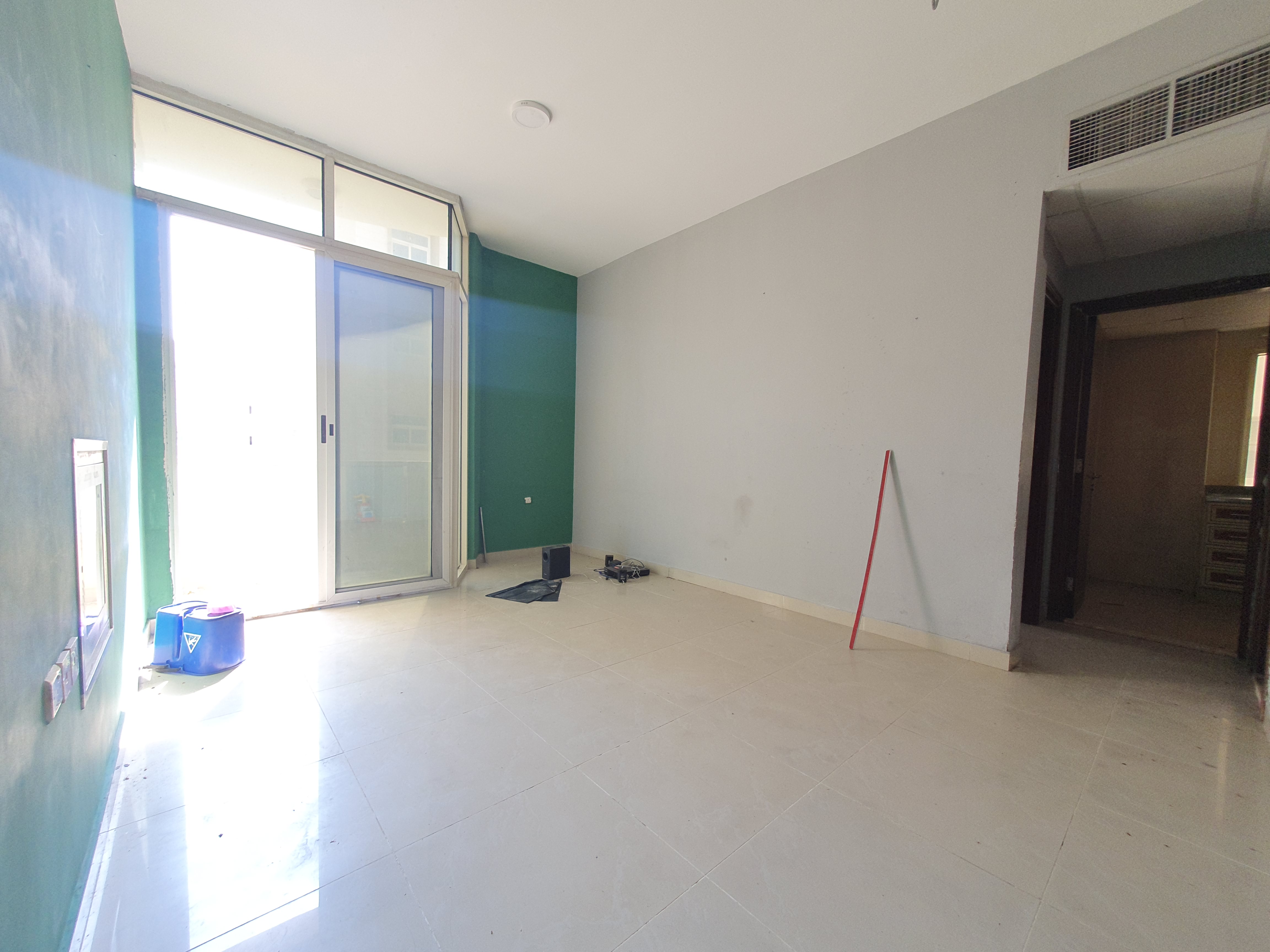 LAVISH 1BHK WITH BALCONY WITH CENTRAL AC IN MUWAILEH