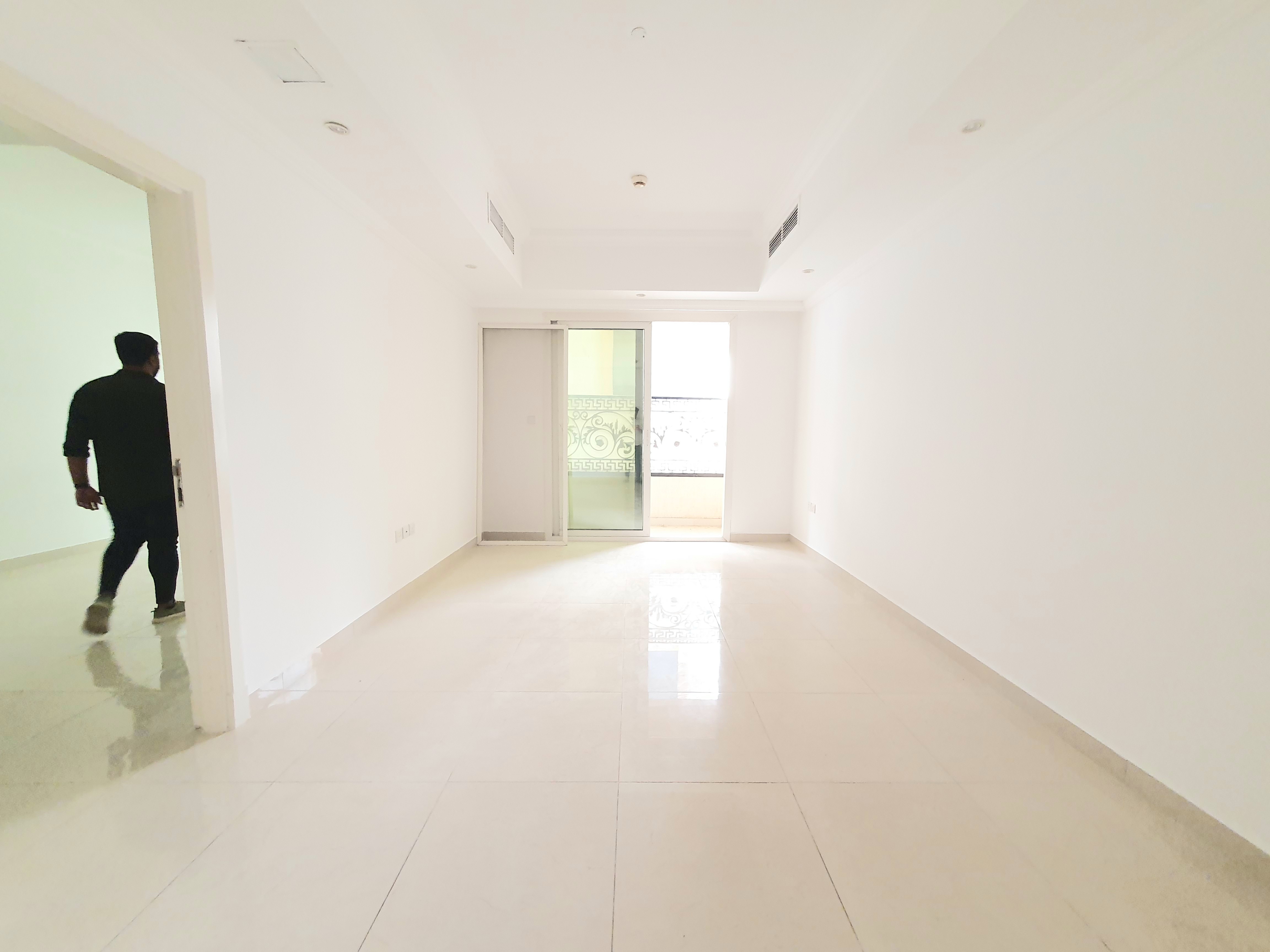 BIG SIZE 1BHK WITH 2 WASHROOMS WITH CAR PARKING 30 DAYS FREE SCHOOL AREA IN MUWAILEH