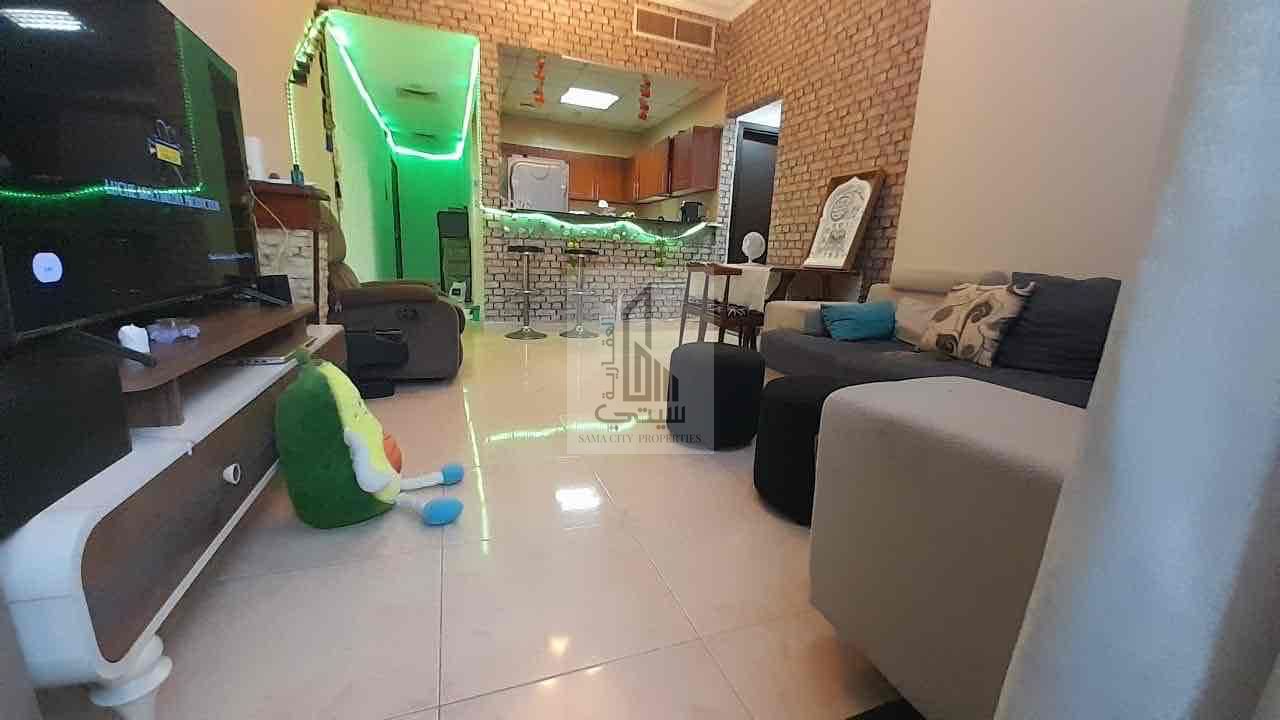 Two rooms and a hall with furniture. Government electricity and water 22nd floor 1 car parking space Emirates Towers