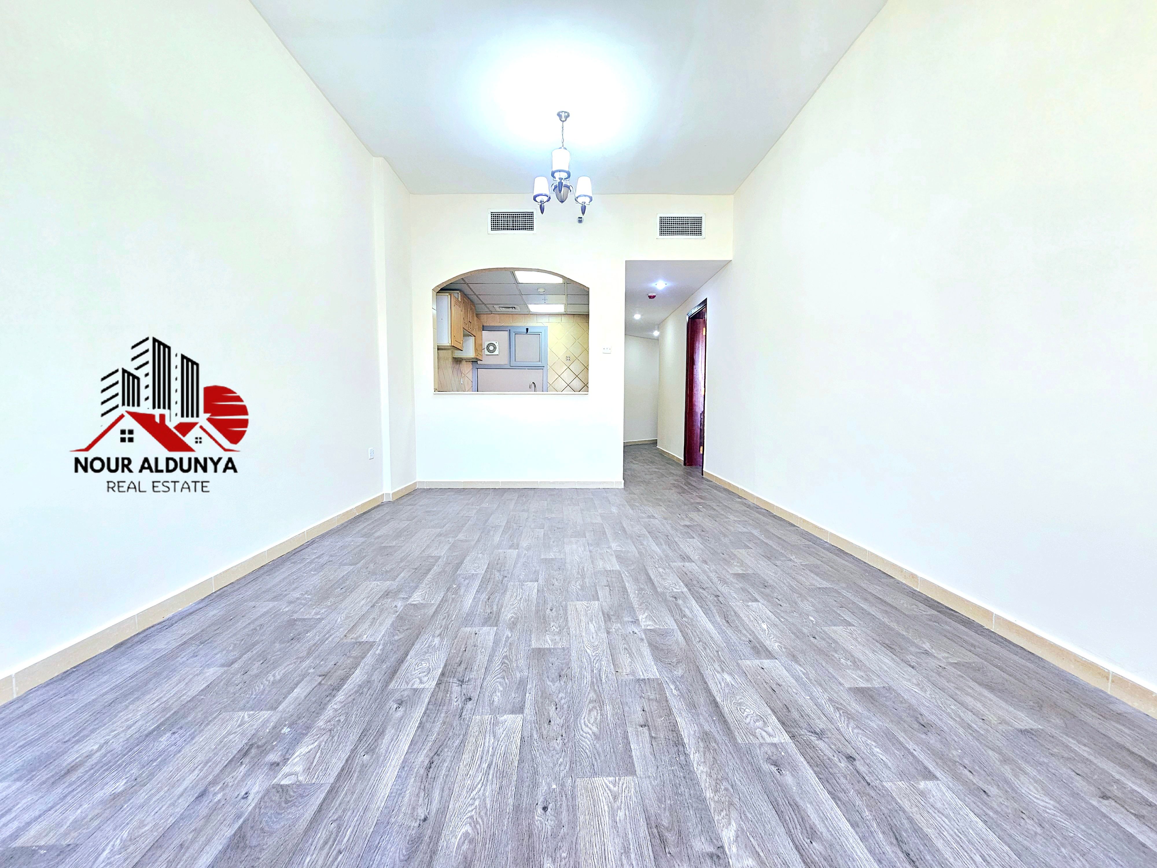 12 CHEQUES - SPACIOUS 1BHK RENT 52K - FAMILY BUILDING - CAR PARKING FREE - CLOSE TO NMC HOSPITAL