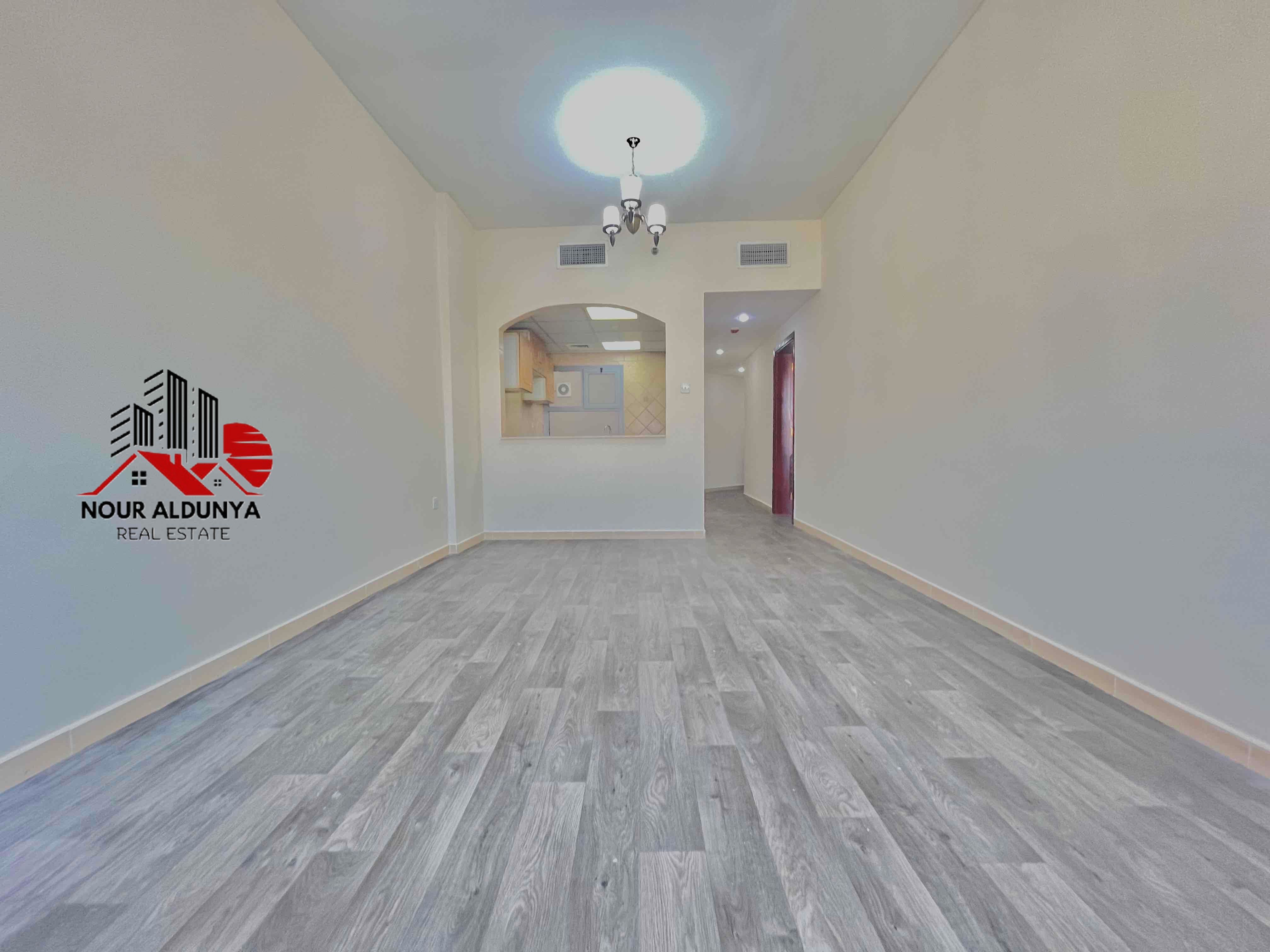12 CHEQUES - SPACIOUS 1BHK RENT 48K - FAMILY BUILDING - CAR PARKING FREE - CLOSE TO NMC HOSPITAL