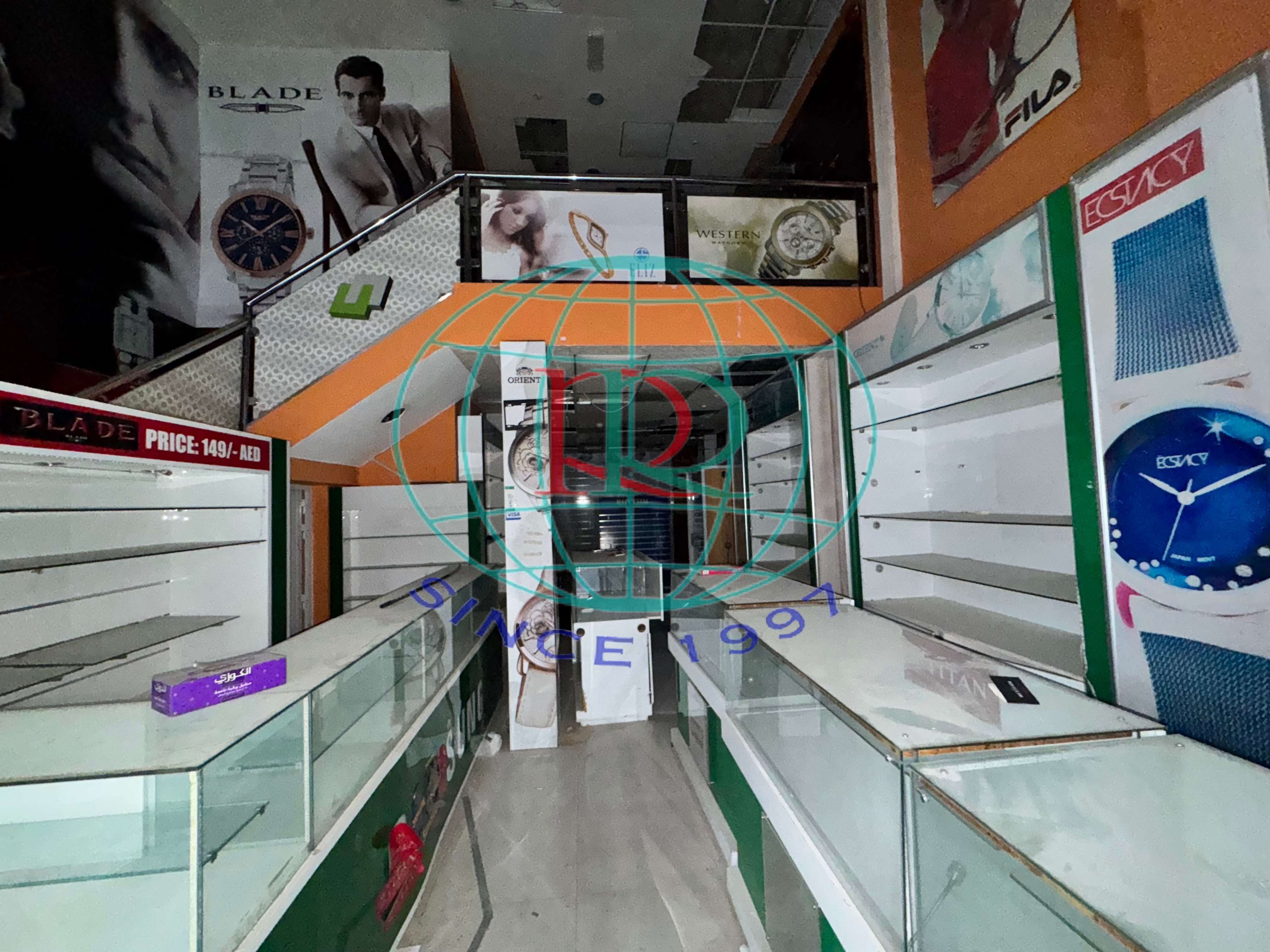 SPACIOUS RETAIL STORE WITH AN ADDITIONAL MEZZANINE FLOOR, SITUATED ON AROUBA ROAD NEAR JANATA BANK.