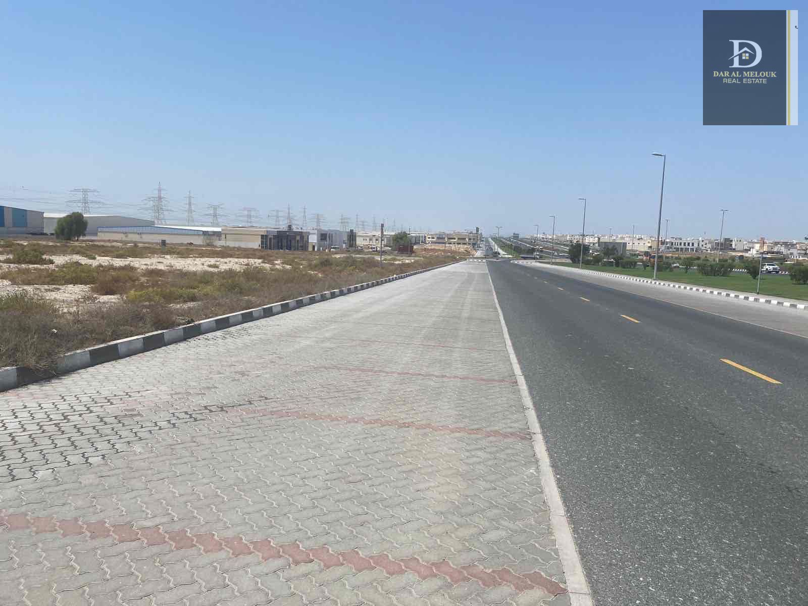 For sale in Sharjah Industrial Area 18, a commercial industrial land with an area of 12,900 feet, an industrial commercial permit, the land is on t