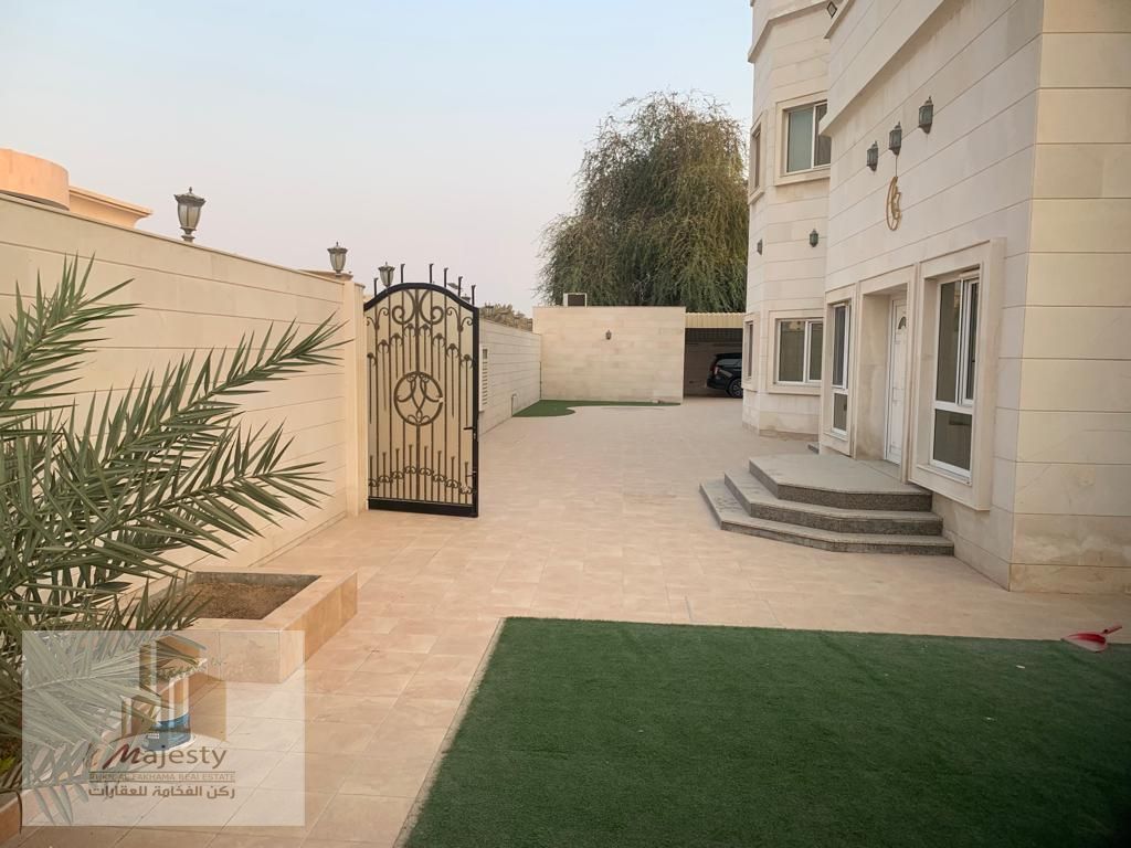 For sale villa in the Emirate of Sharjah, Al Yash area, a charcoal stone villa, a large area