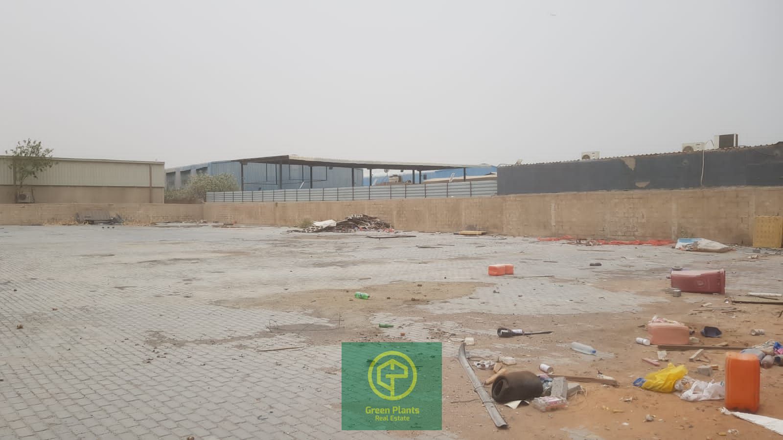 Al Sajja 21,000 sq. Ft open yard with built-in shops / showroom