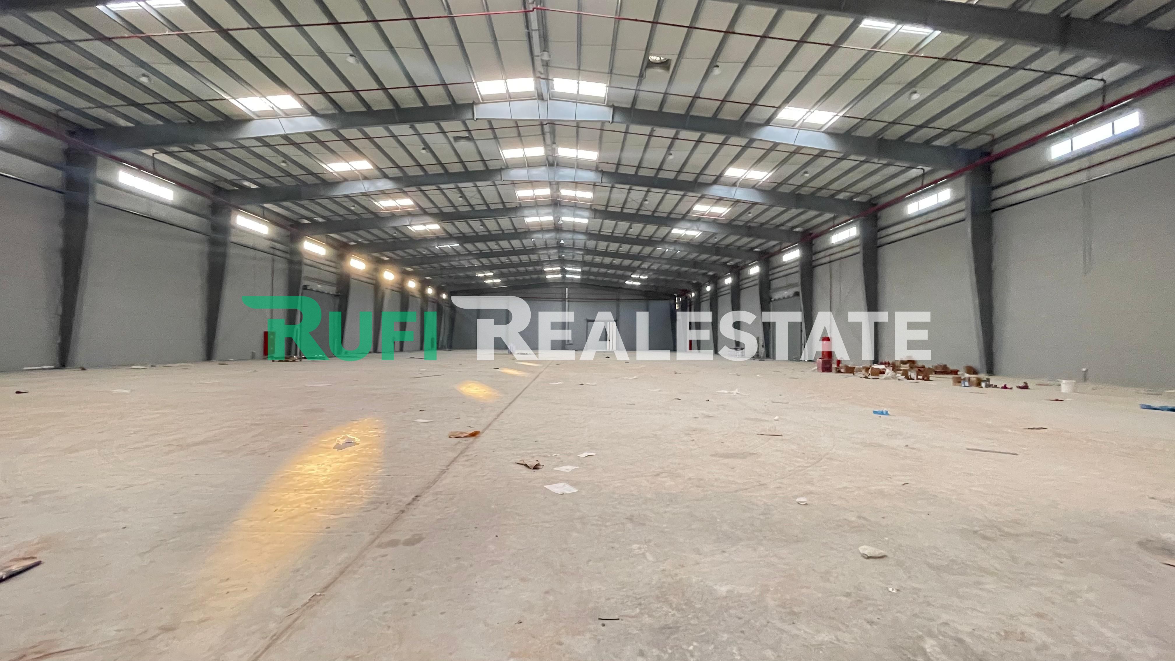 READY TO MOV Electricity can be increased Road Facing//56,000 SQFT Warehouse FOR RENT in EMIRATES MODERN INDUSTRIAL AREA