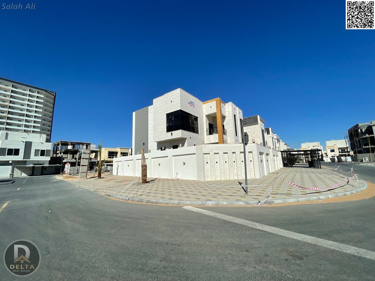 For sale, a corner villa, 5 super deluxe corner rooms, ground and first floor, for sale in Al Helio, Ajman, opposite Fam Tower - freehold