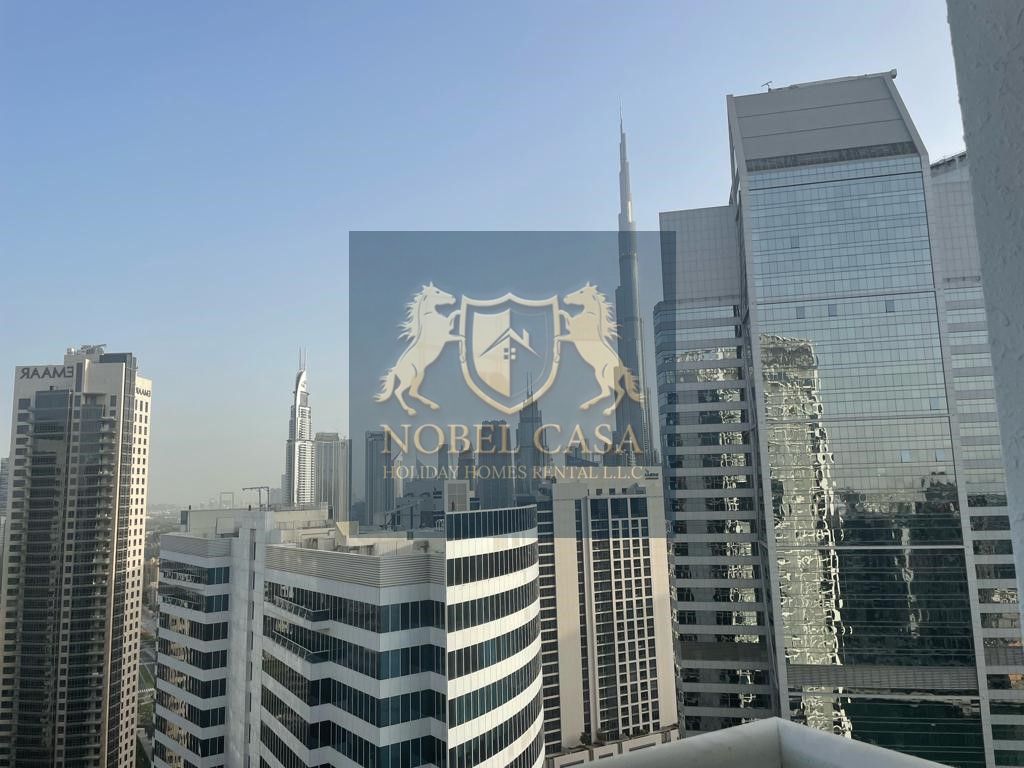 Fully Furnished Studio with Canal & Partial Burj Khalifa View in Business Bay – All Bills Included