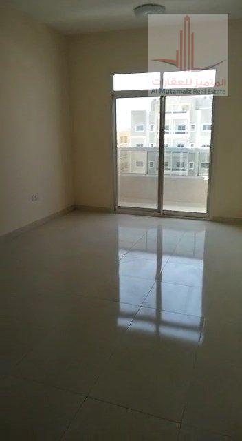Two bedrooms, a living room, three bathrooms, and two balconies for annual rent. Spacious, excellent location with easy access to Dubai.