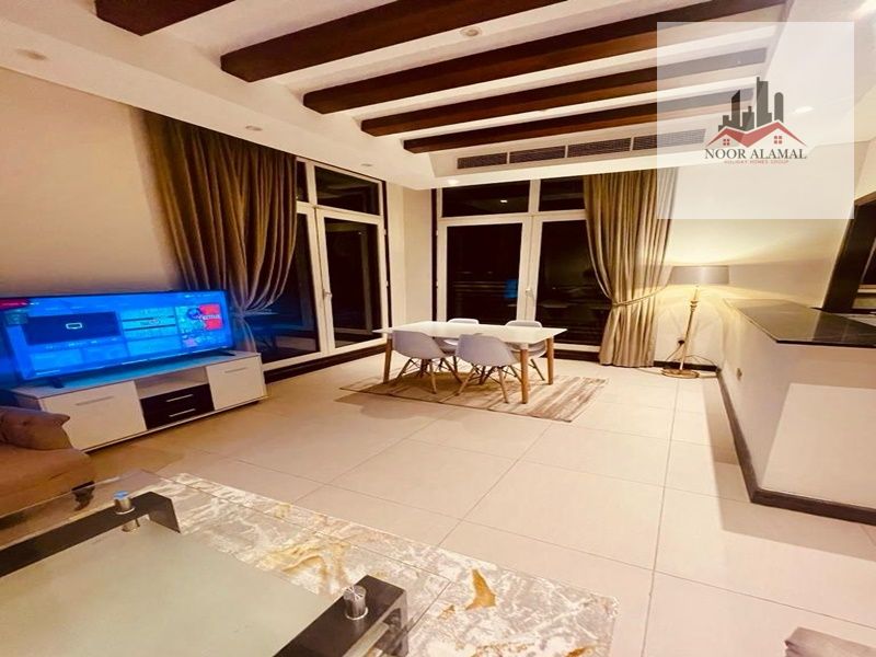 Sharjah Al Riffa, two rooms, a hall, a direct sea view, a kitchen, two bathrooms, hotel furniture, price 6000, including internet, gas, and parking