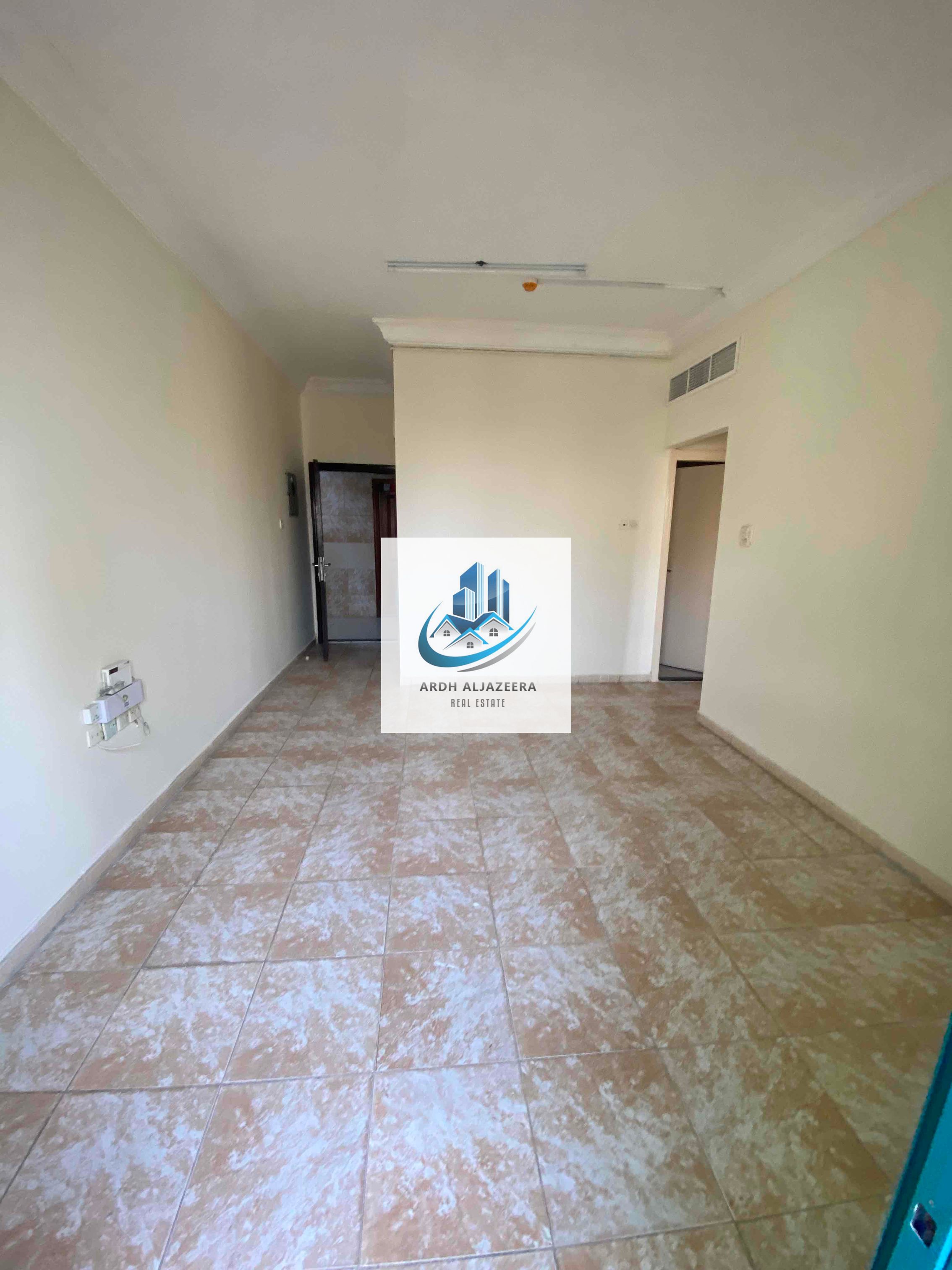 **Spacious 1BHK in a Fully Family Building with Balcony – One Month Free! Available in 6 Cheques Near Sahara Center, Al Nahda, Sharjah**
