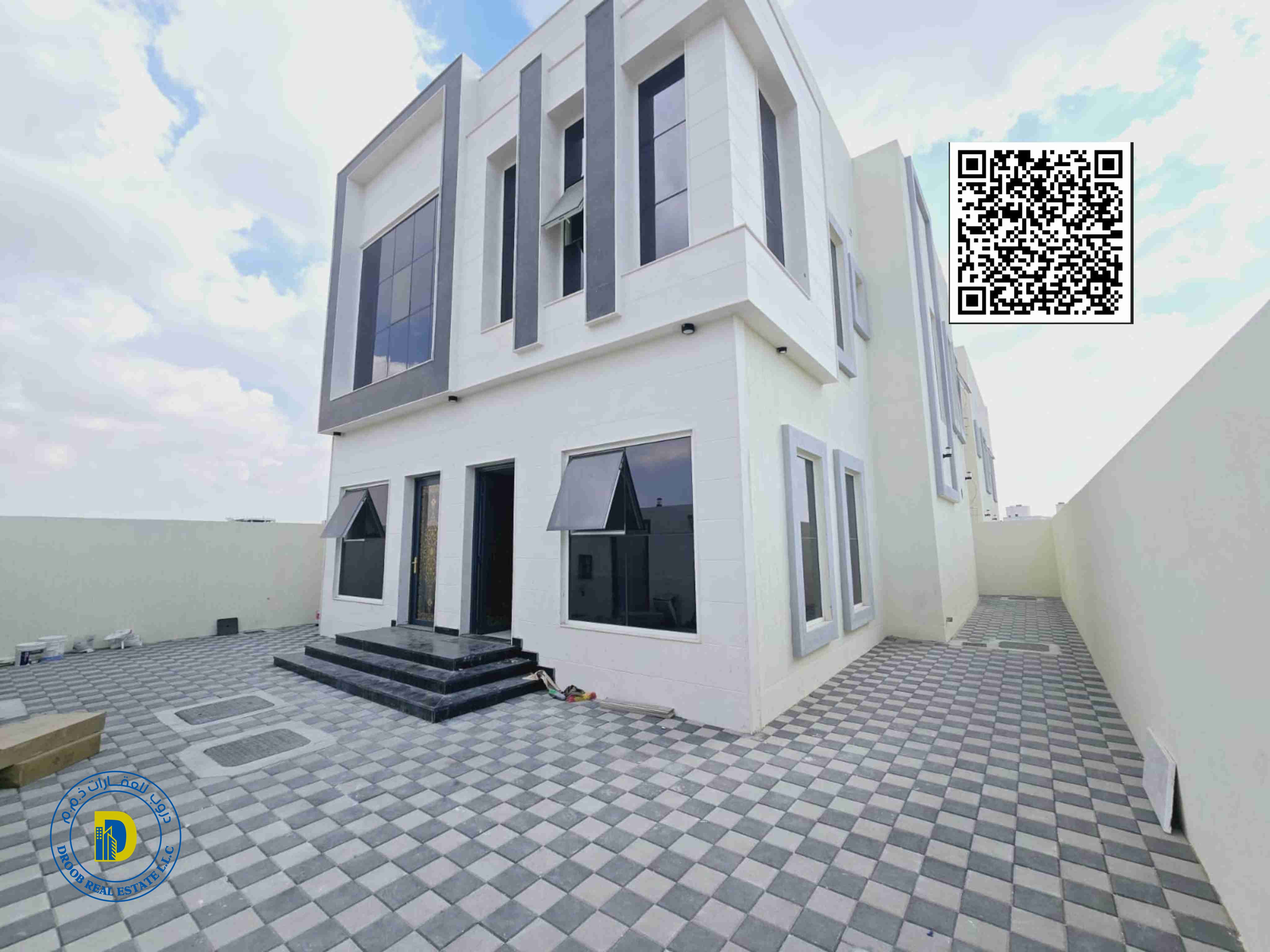 For sale in Al Yasmeen area, Ajman, a modern villa with 5 rooms, 100% bank financing. The price includes registration fees.