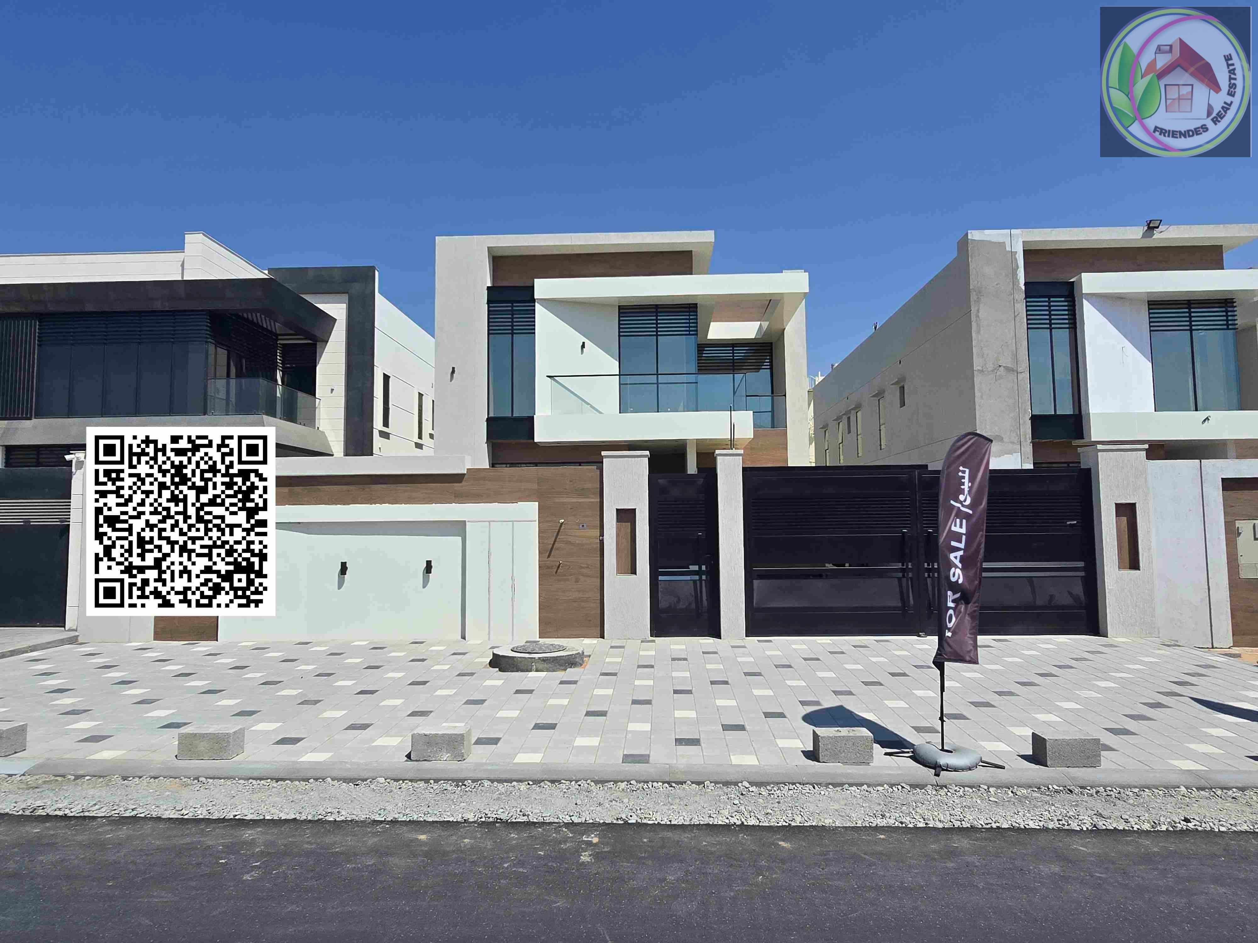 A fully furnished villa in Ajman, including air conditioning, electricity, and water, featuring super deluxe finishes, custom construction, a prime lo