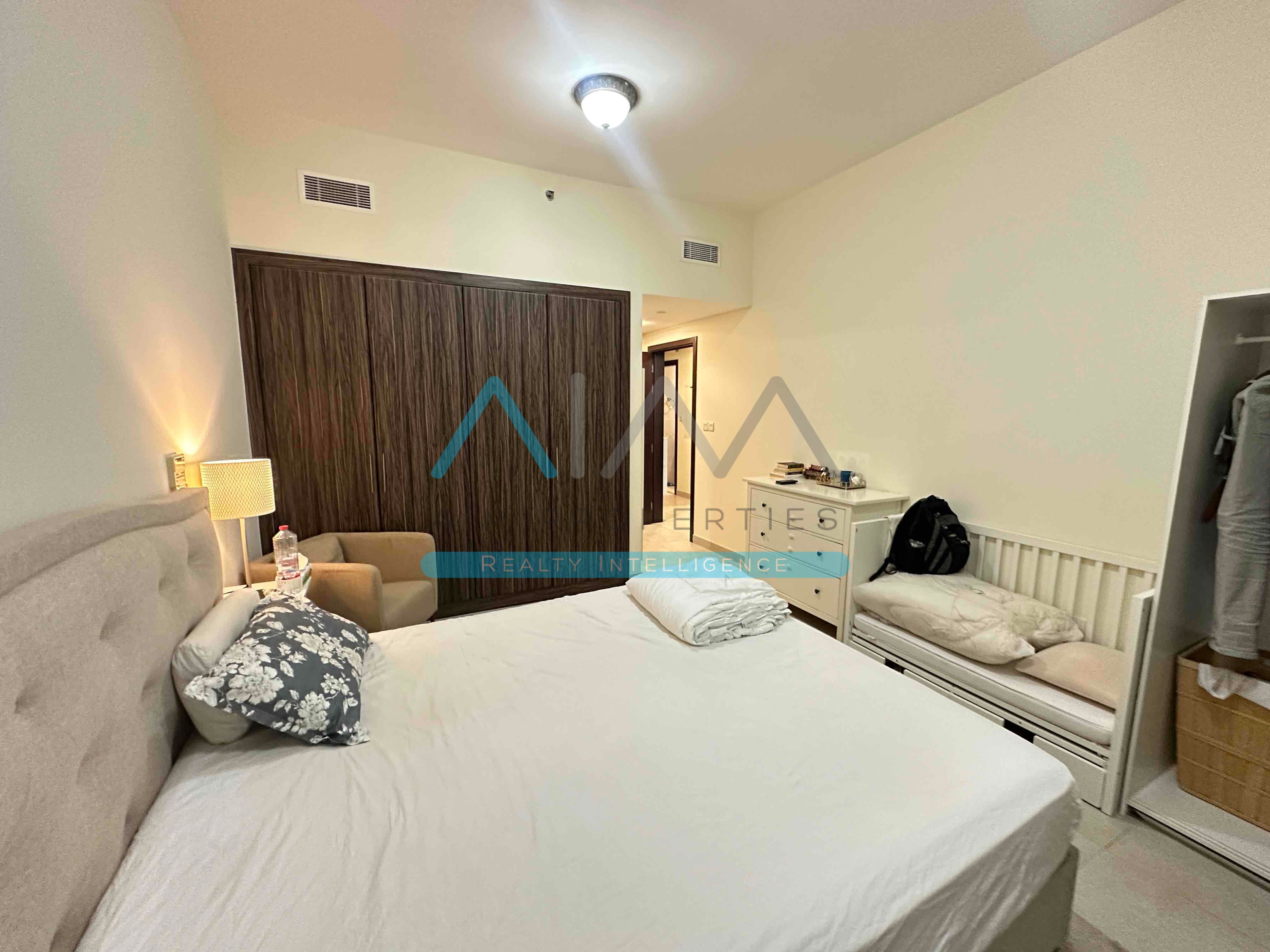 Spacious 1-Bedroom Apartment with Open Views on a High Floor – Available for Rent at 60,000 AED.