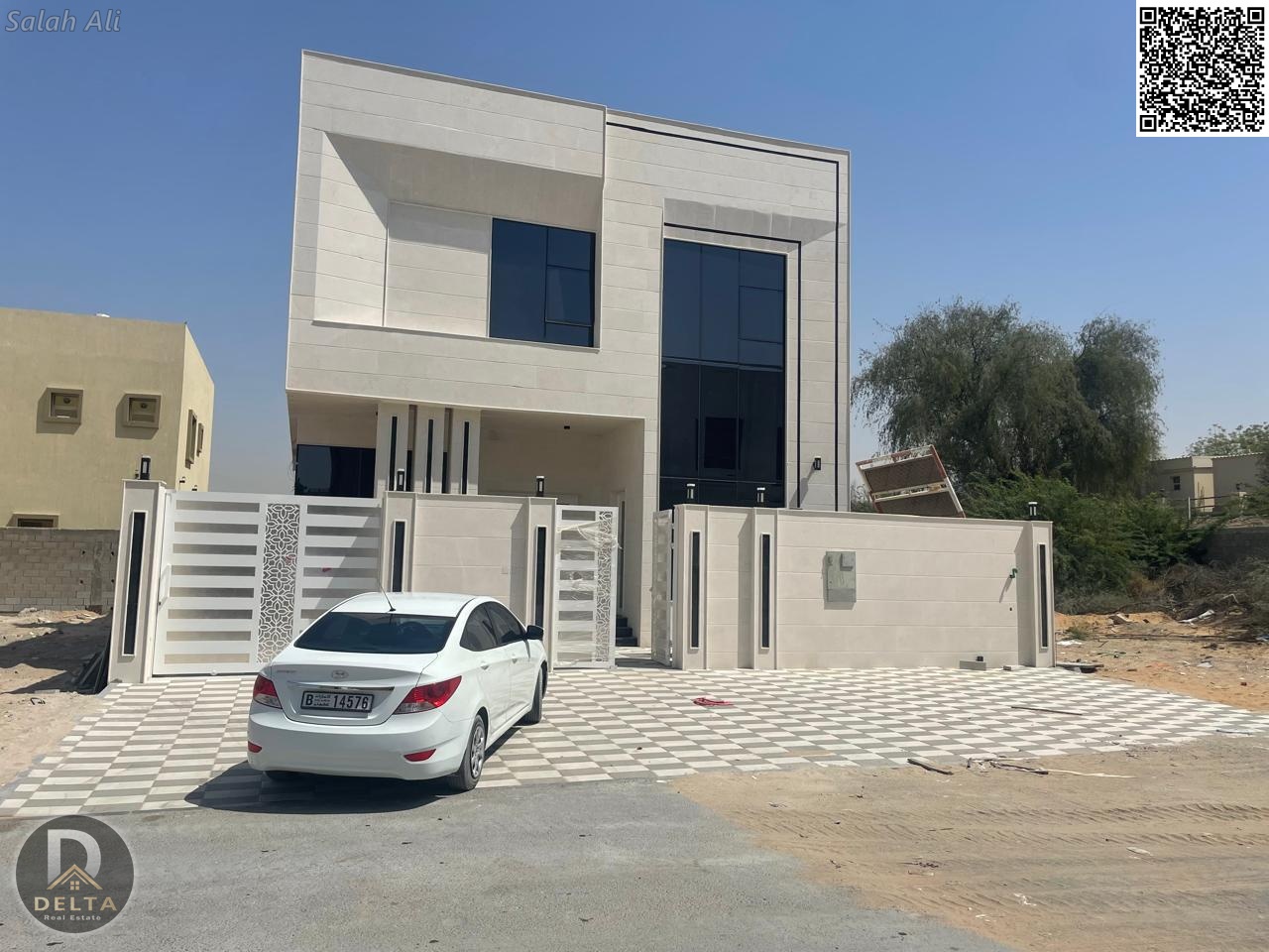 For sale, a spacious villa with a very large setback on a main street in the heart of Al Zahia, freehold for all nationalities.