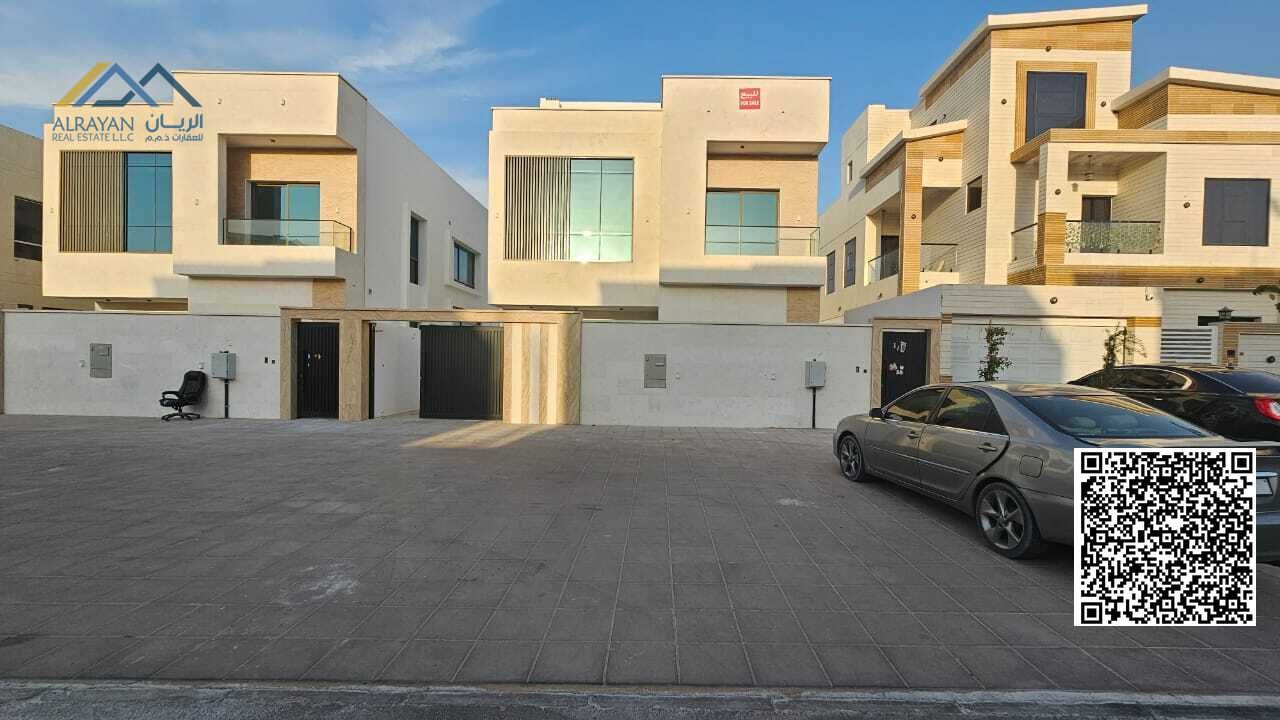 New villa for sale in Ajman Al Yasmeen, 6 master bedrooms, living room, kitchen, prep kitchen with swimming pool