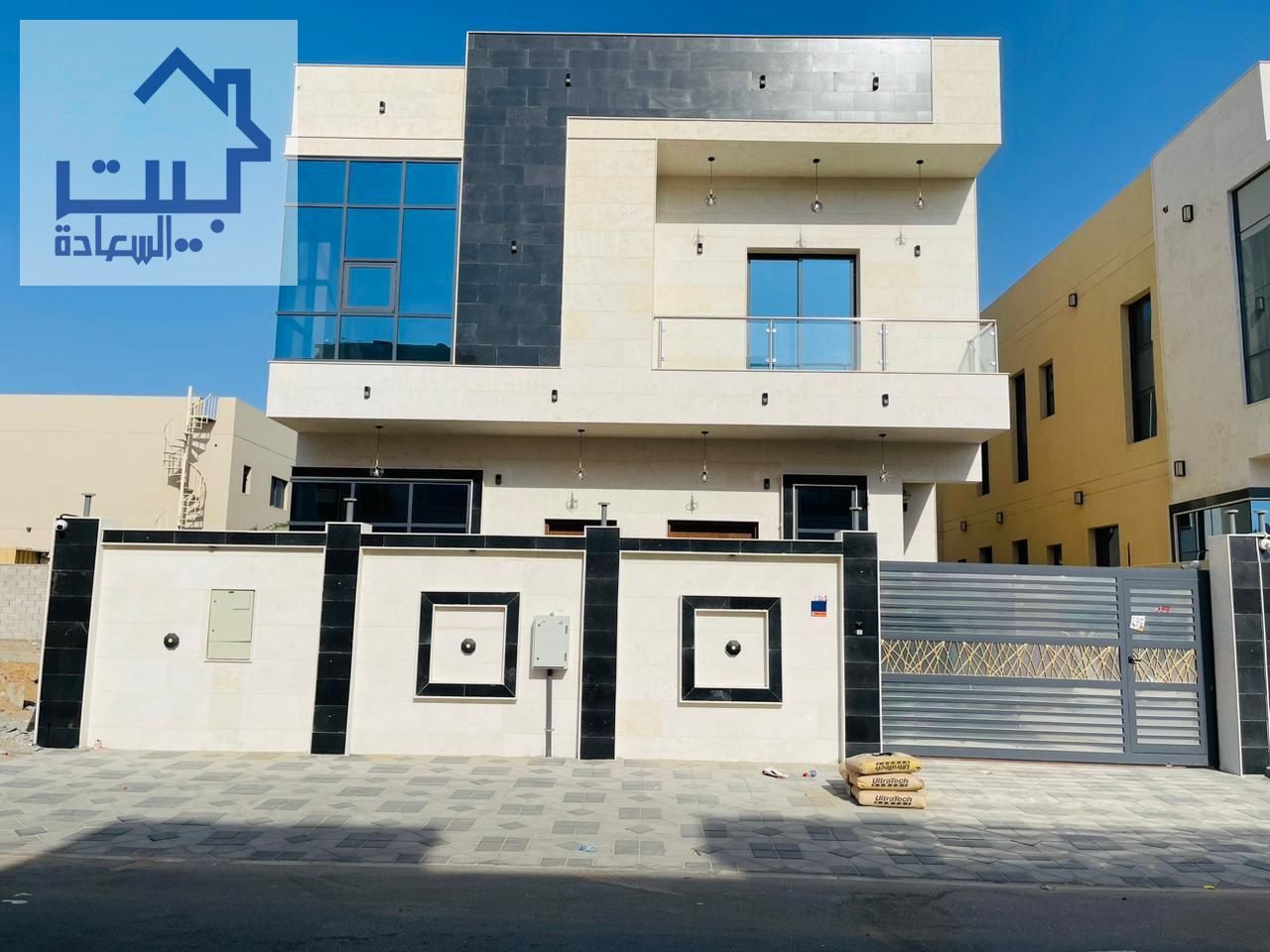 For rent in Al Zahya area, Ajman, a villa with 5 rooms, a hall, a maid’s room, two floors and a roof