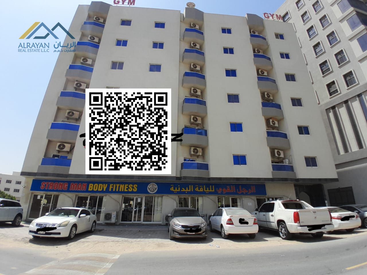 A huge building for sale in Al Rawda area, land area 12,000 square feet, consisting of a ground floor + 6 floors with parking, opposite the mosque and