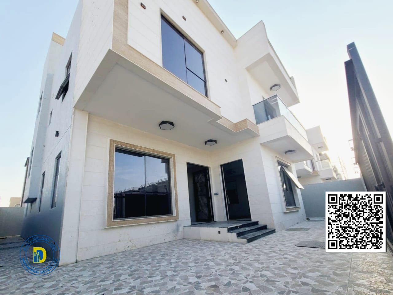 For sale in Al Yasmeen, Ajman, a 6-bedroom villa, modern finishing, a distinguished location, a main street