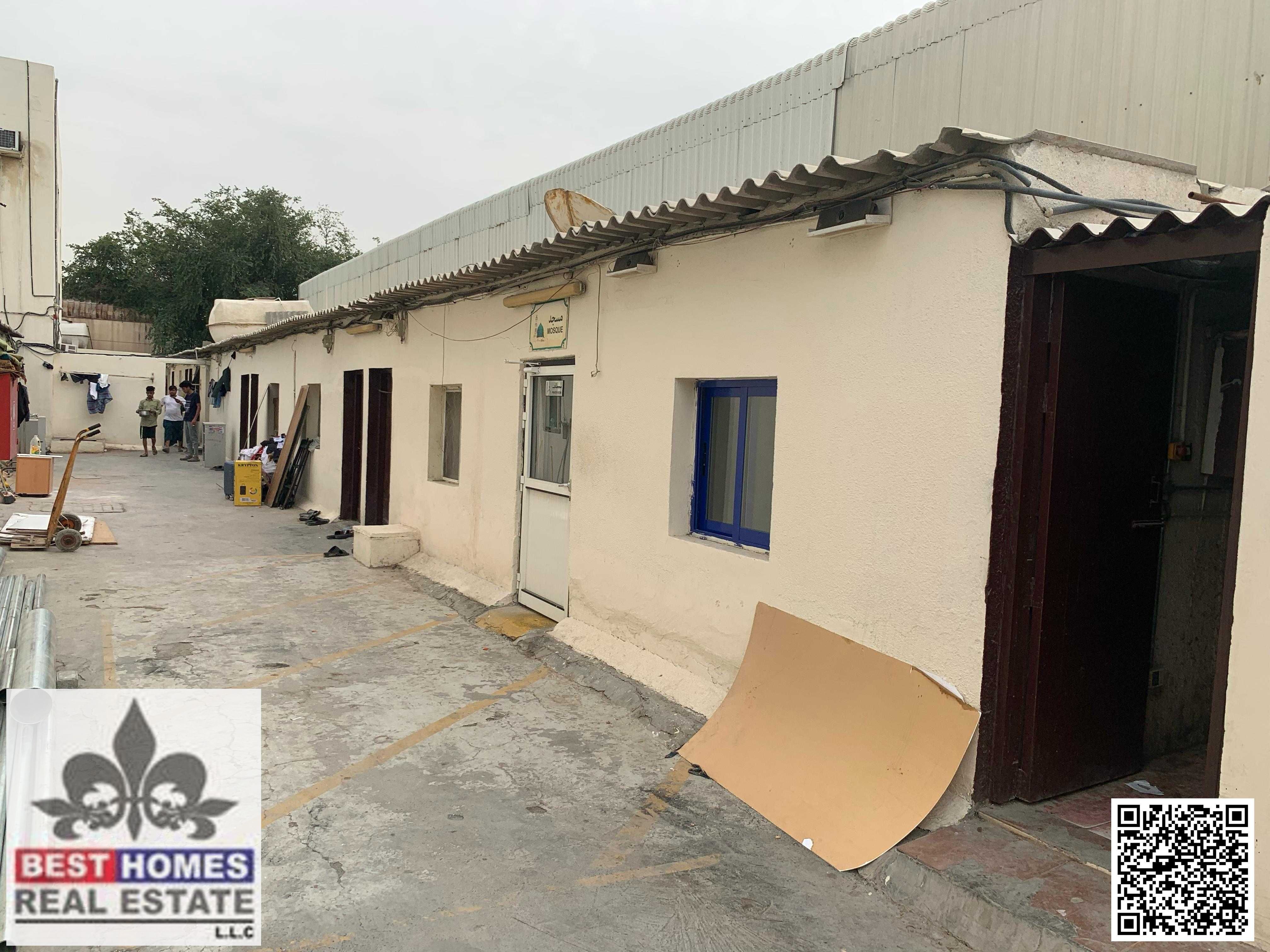 Industrial Property for Sale in Al Jurf with warehouse and rooms in Ajman