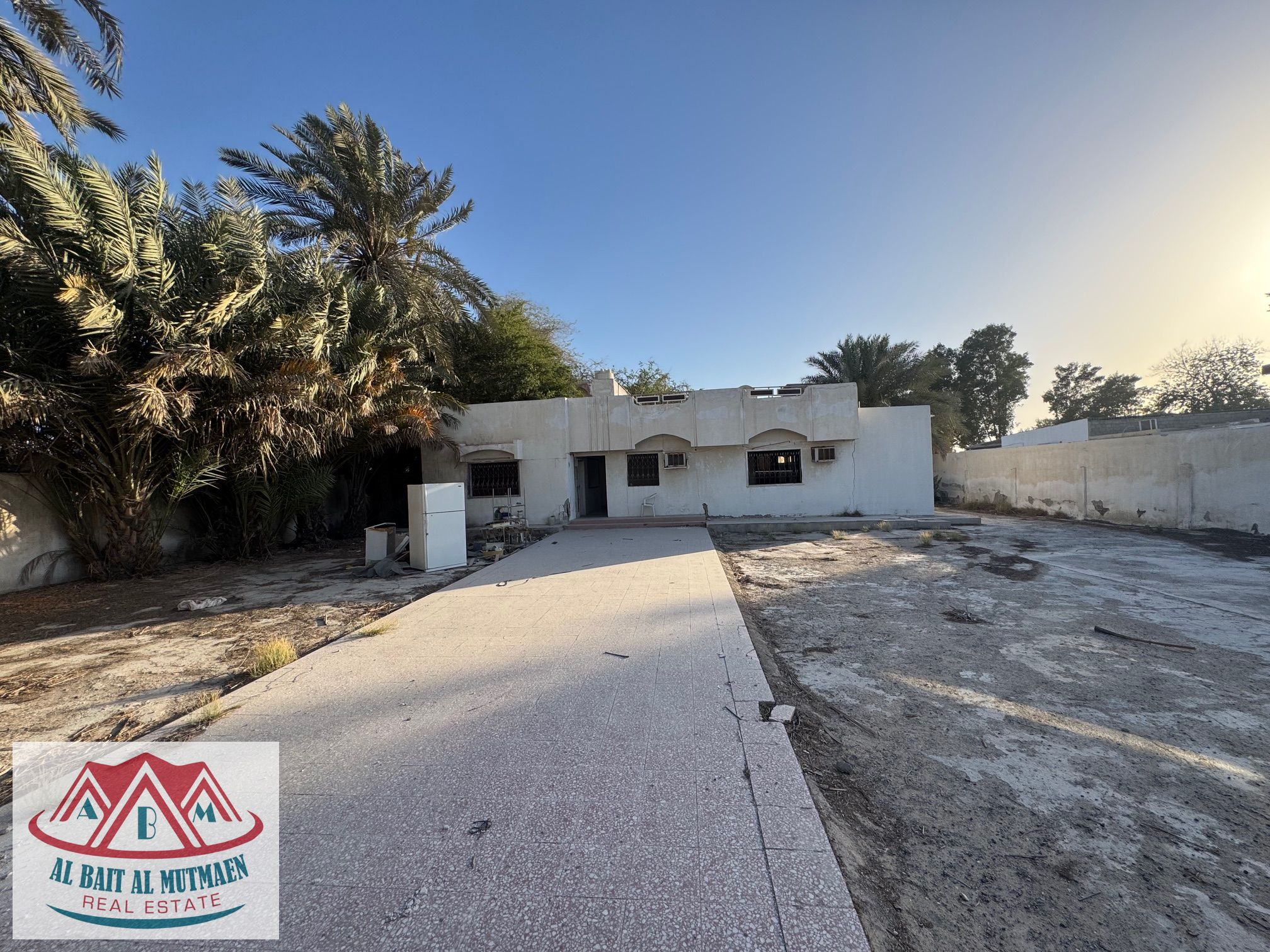 Four-room corner house on a tarred street in Al Ghafia