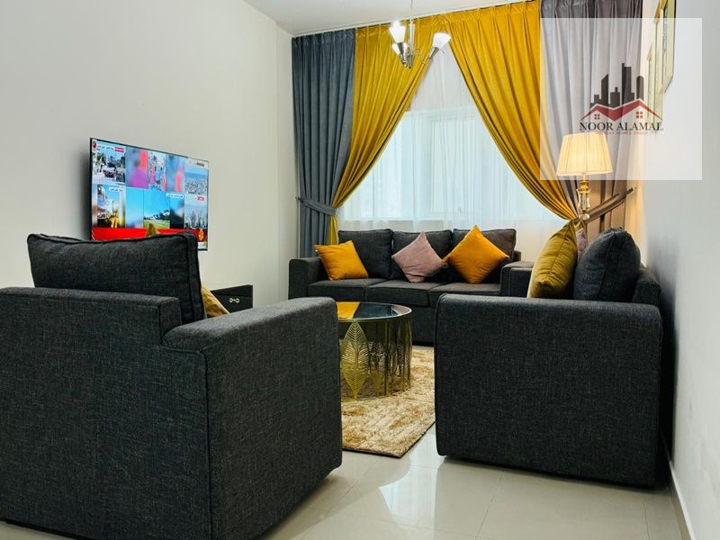 Sharjah Al Taawun, two rooms, a hall, a kitchen, two bathrooms, and a balcony with a view. The price is 6000, including internet and parking.