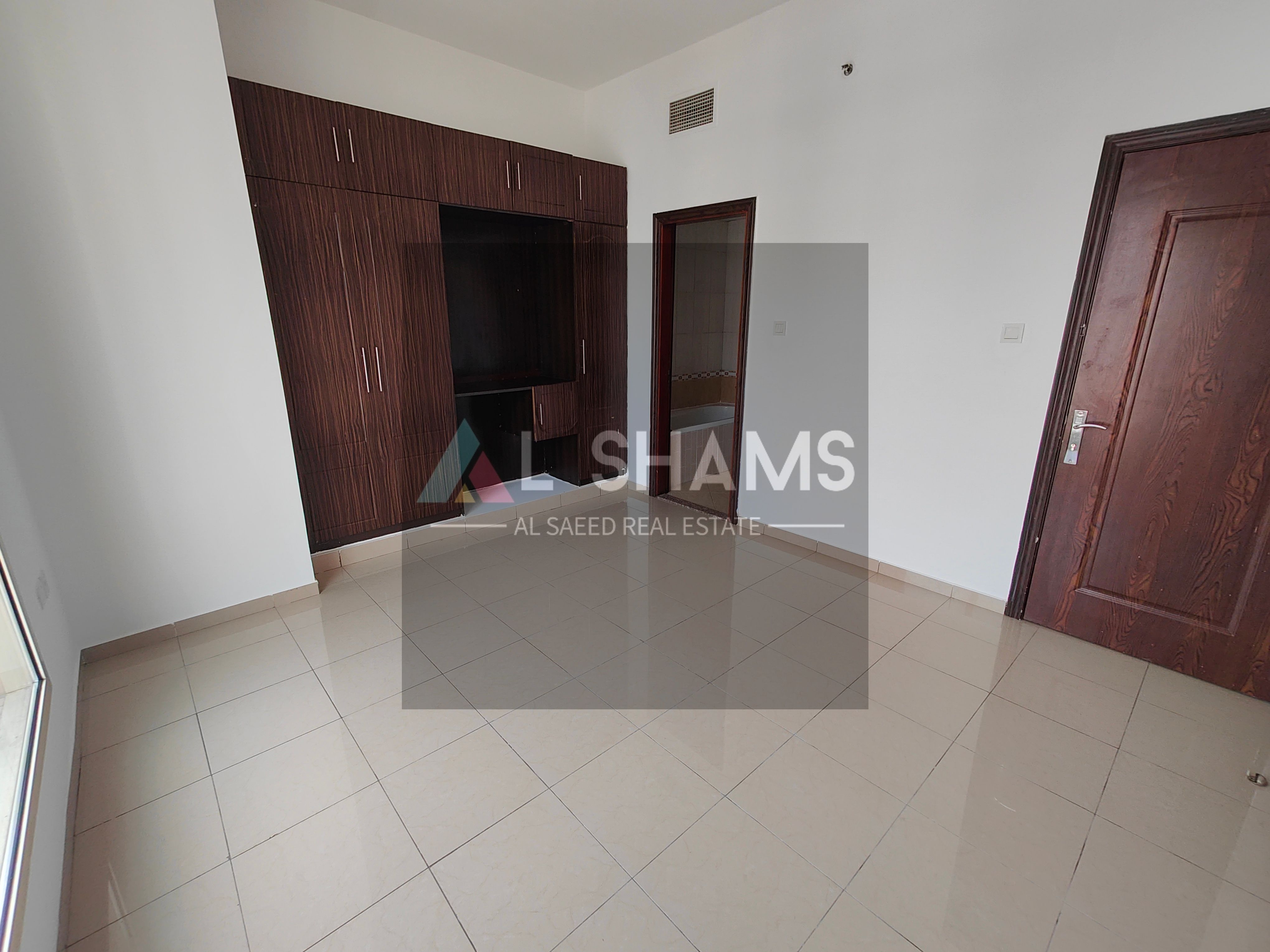 Spacious 1 BHK Apartment with Balcony, Wardrobes, Gym, and Pool