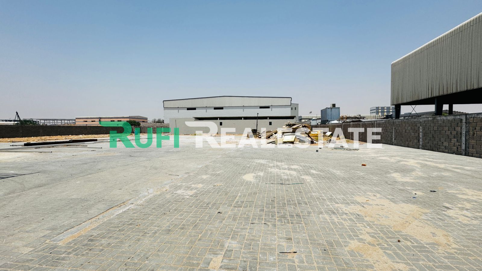 ** Road Facing/ 53,820SQFT Industrial Land With Warehouse For Rent in Emirates Modern Industrial Area, Umm Al Quwain **