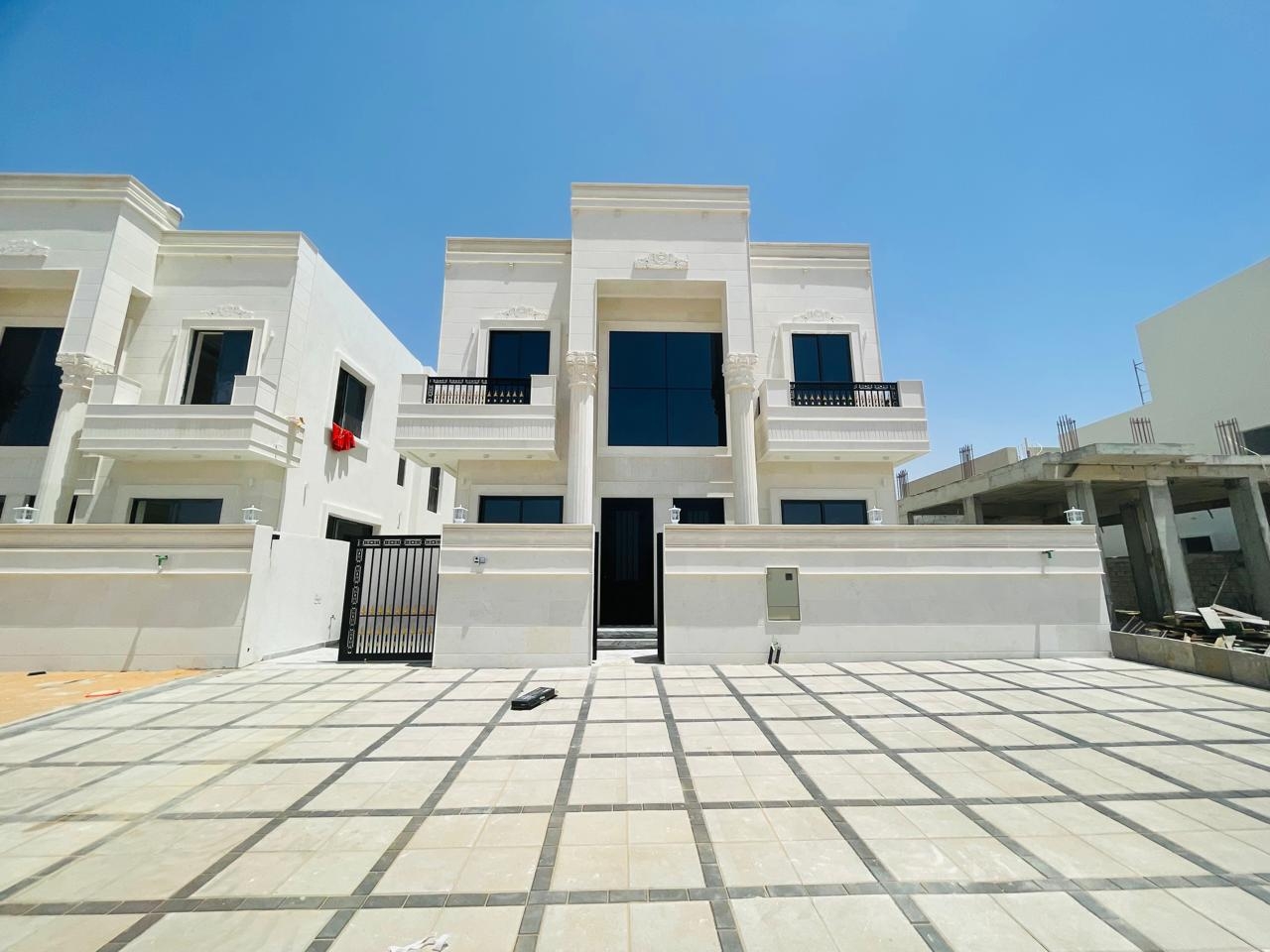 Luxury classic villa for sale in Al Helio area - Ajman The price includes registration, ownership, and electricity and water connection fees