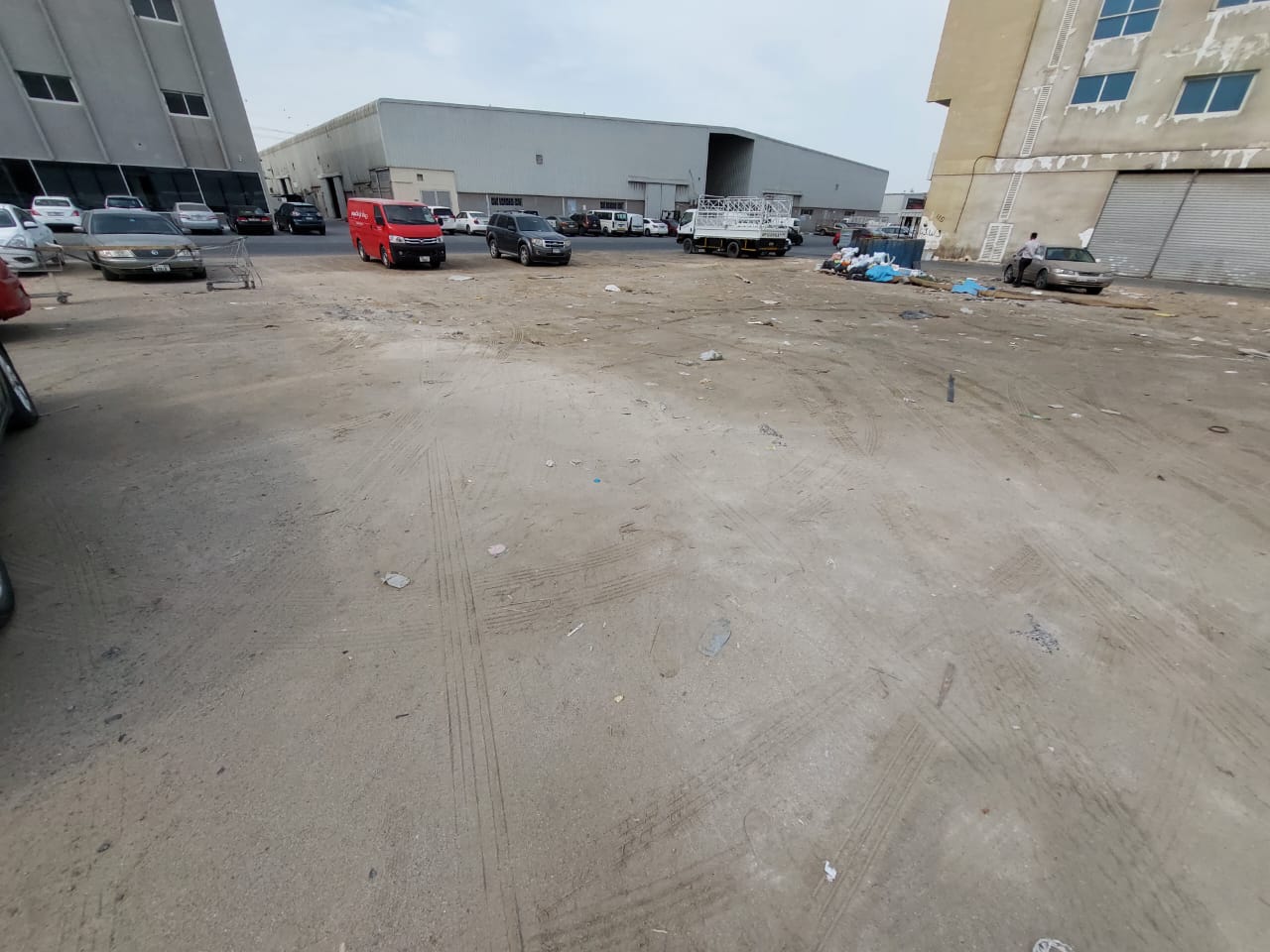 140000 SQRFT OPENT LAND YARD GOOD FOR PARKING SMALL OR BIG VEHICLE READY POSITION AVAILABLE FOR RENT NEAR IND AREA 17 ON MAIN ROAD NEXT SAFEER MALL