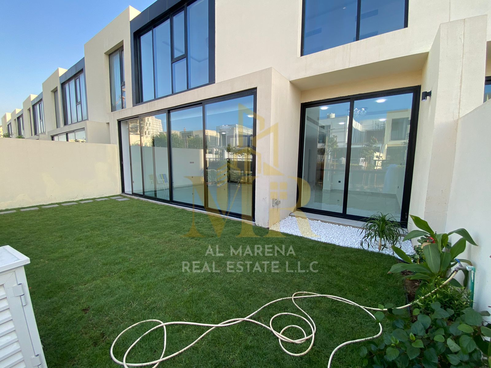 Direct from the owner, a luxurious super deluxe villa for sale in Al Zorah area, Ajman, at a price including electricity, water, and air conditioning.