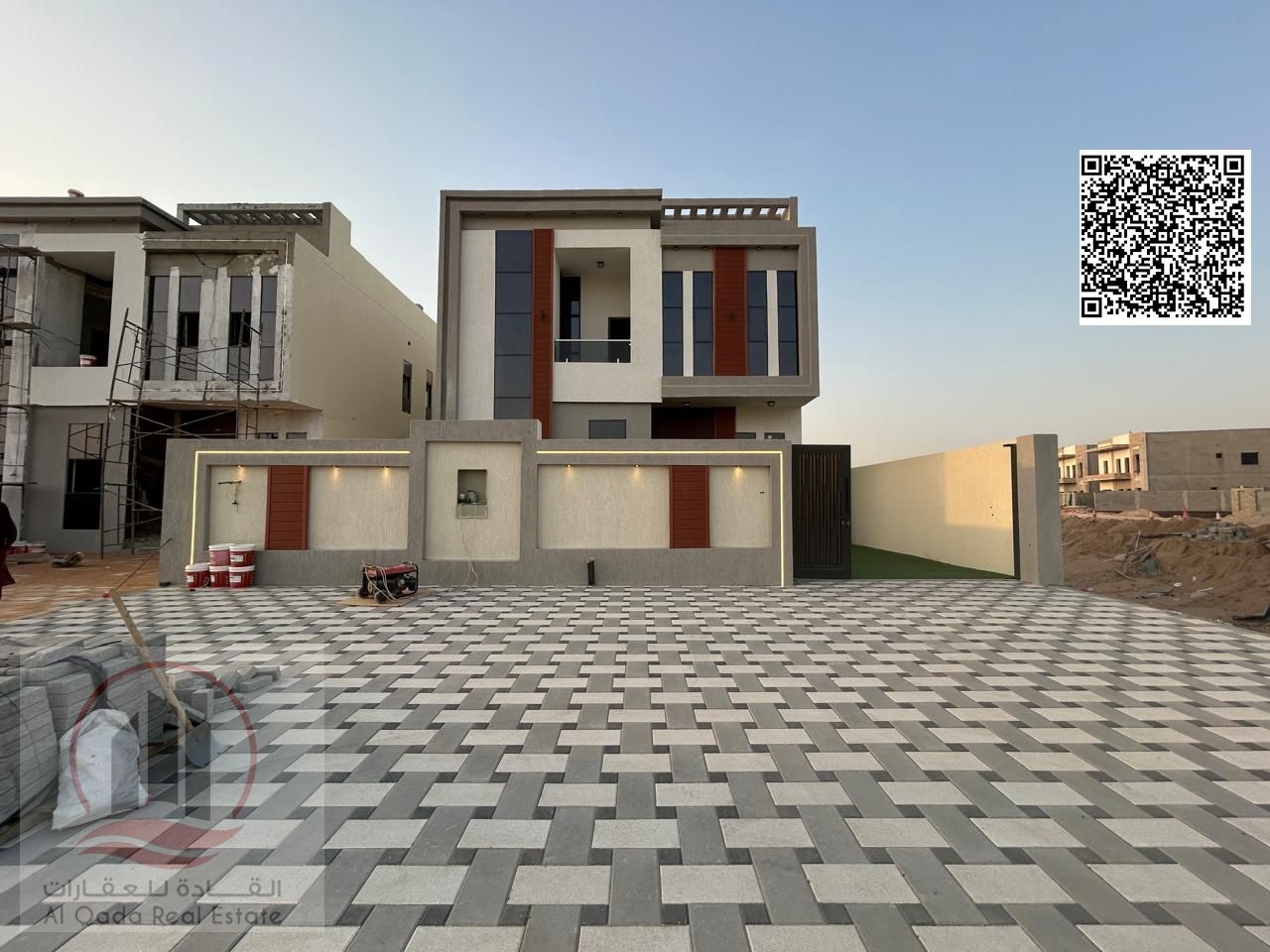 Villa for sale in Ajman, Al Helio 2 area. The villa includes registration fees (4 master bedrooms + a large living room with sinks + a large hall, a m