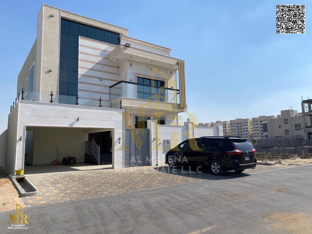 For sale, a luxury villa in a prime location. Price: 1,700,000 AED. Building area: 3,400 square feet. Land area: 3,014 square feet.