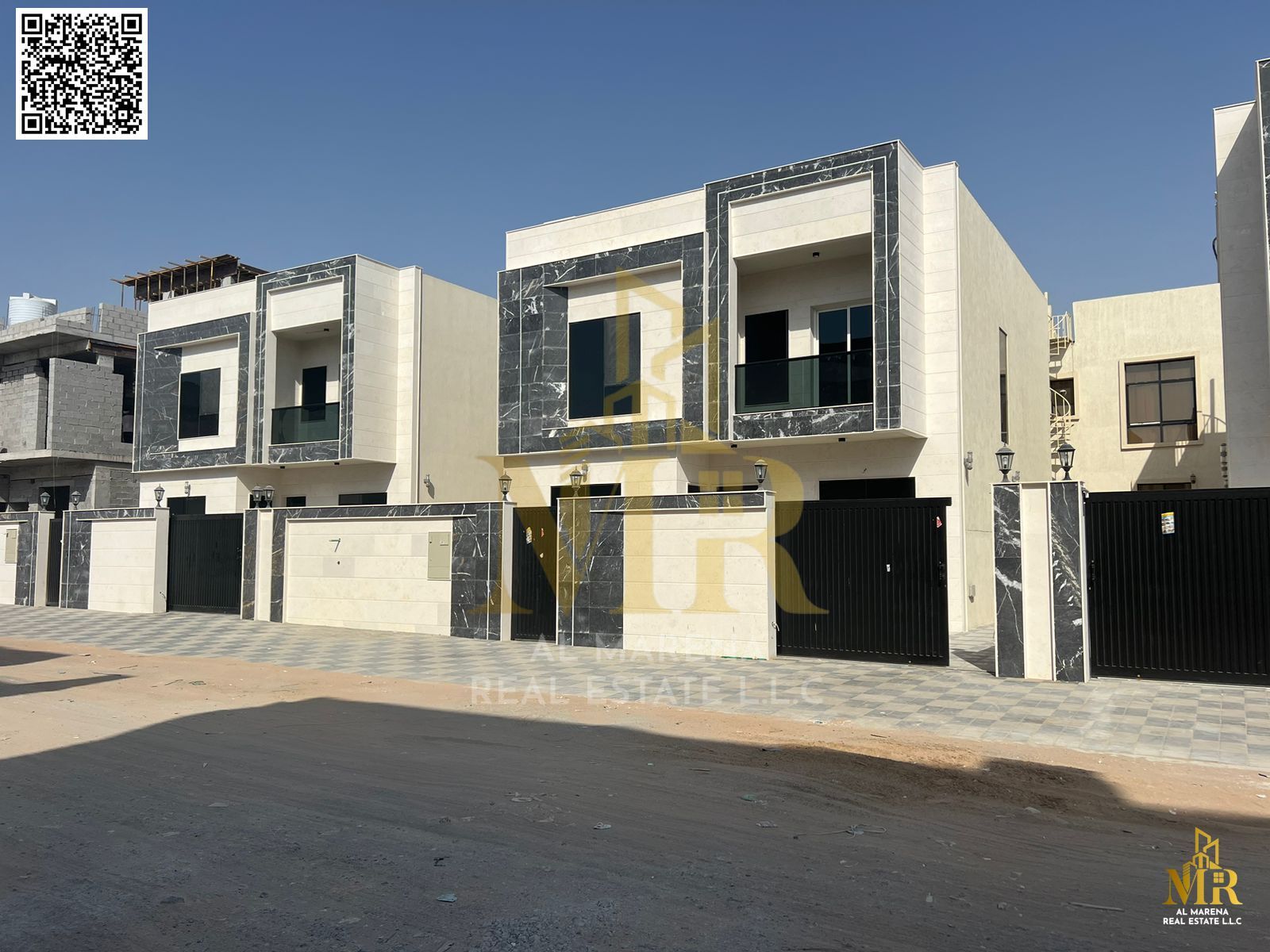 A distinctive villa in Al Helio 2 consisting of 4 master bedrooms, a hall and a living room, at a price including ownership fees.