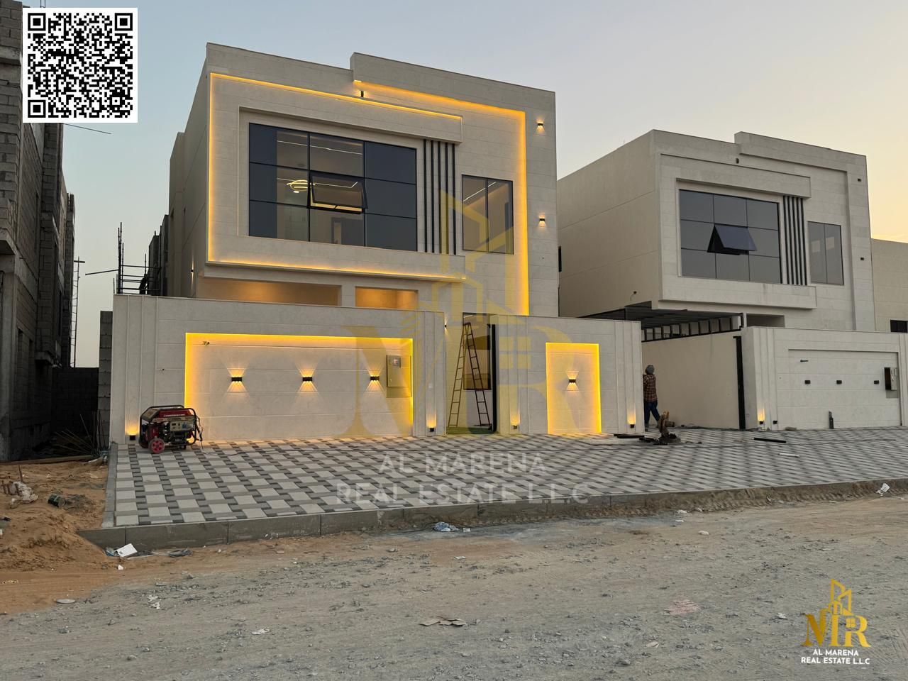 A distinctive villa in Al Helio 2 consisting of 4 master bedrooms, a hall and a living room, at a price including ownership fees.