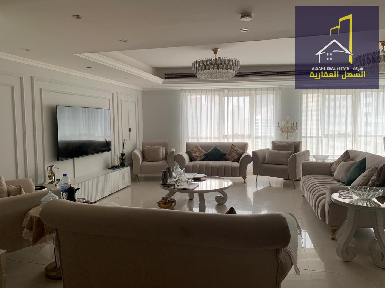 For sale, a 4-bedroom apartment with a hall in Al Majaz 3, with a direct view of Al Qasba