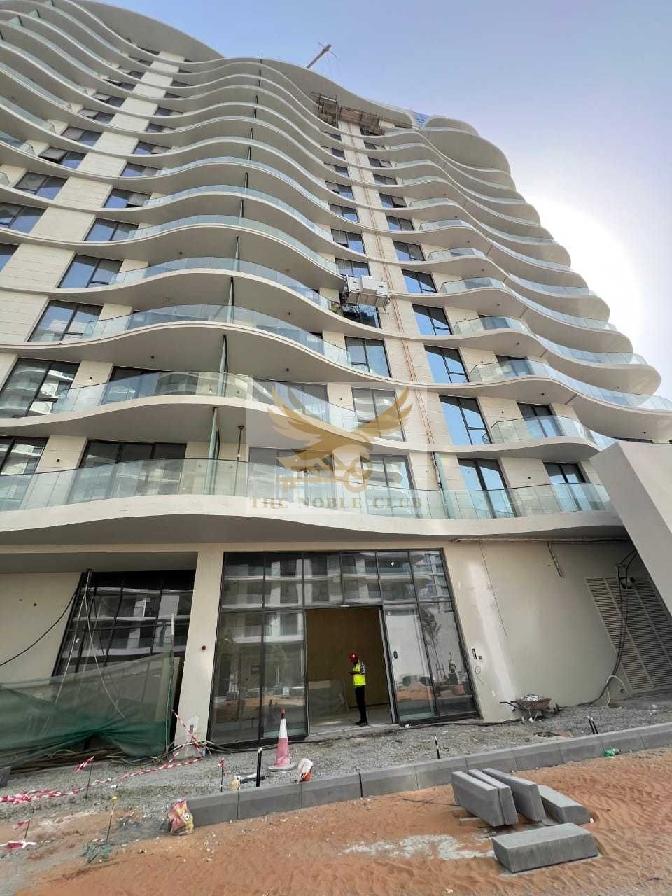 Stunning 1BR Apartment | Partial Sea View | Prime Location