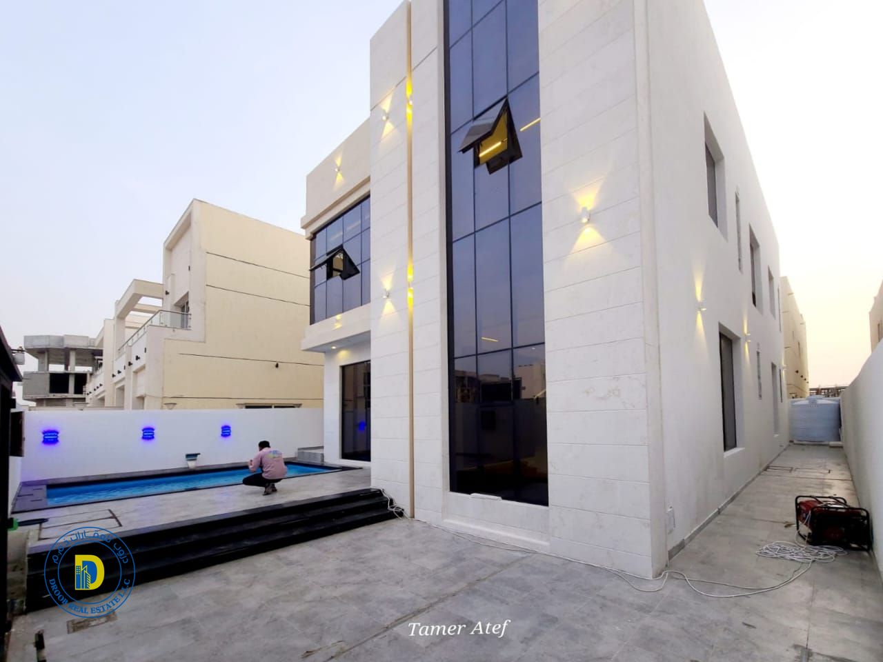 For sale in Al Helio 2 area, a modern villa with 5 rooms and a swimming pool. The price includes registration fees.