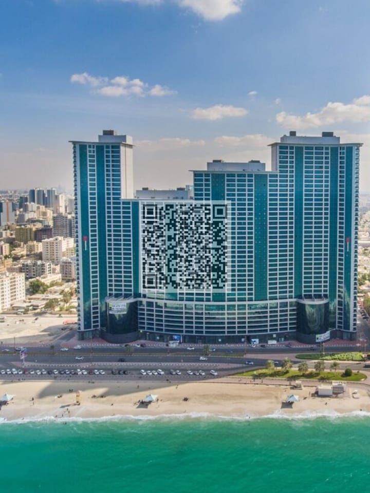 Luxurious 2-Bedroom Apartment with Sea and City Views in Ajman Corniche Residency.