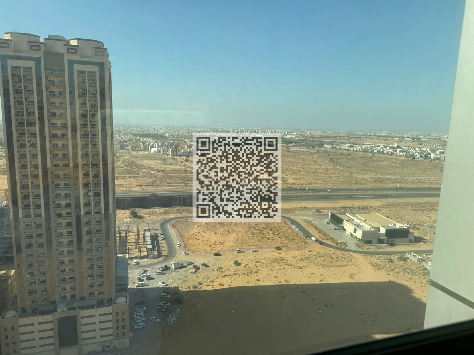 Spacious Two bedroom hall apartment with covered car parking available for rent in Paradise Lake Towers Emirates City Ajman