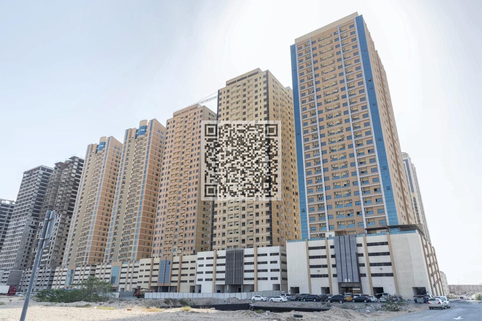 SPACIOUS 2 Bedroom Hall Apartment with Covered Parking for Rent in Paradise Lake Towers B6, Emirates City Ajman